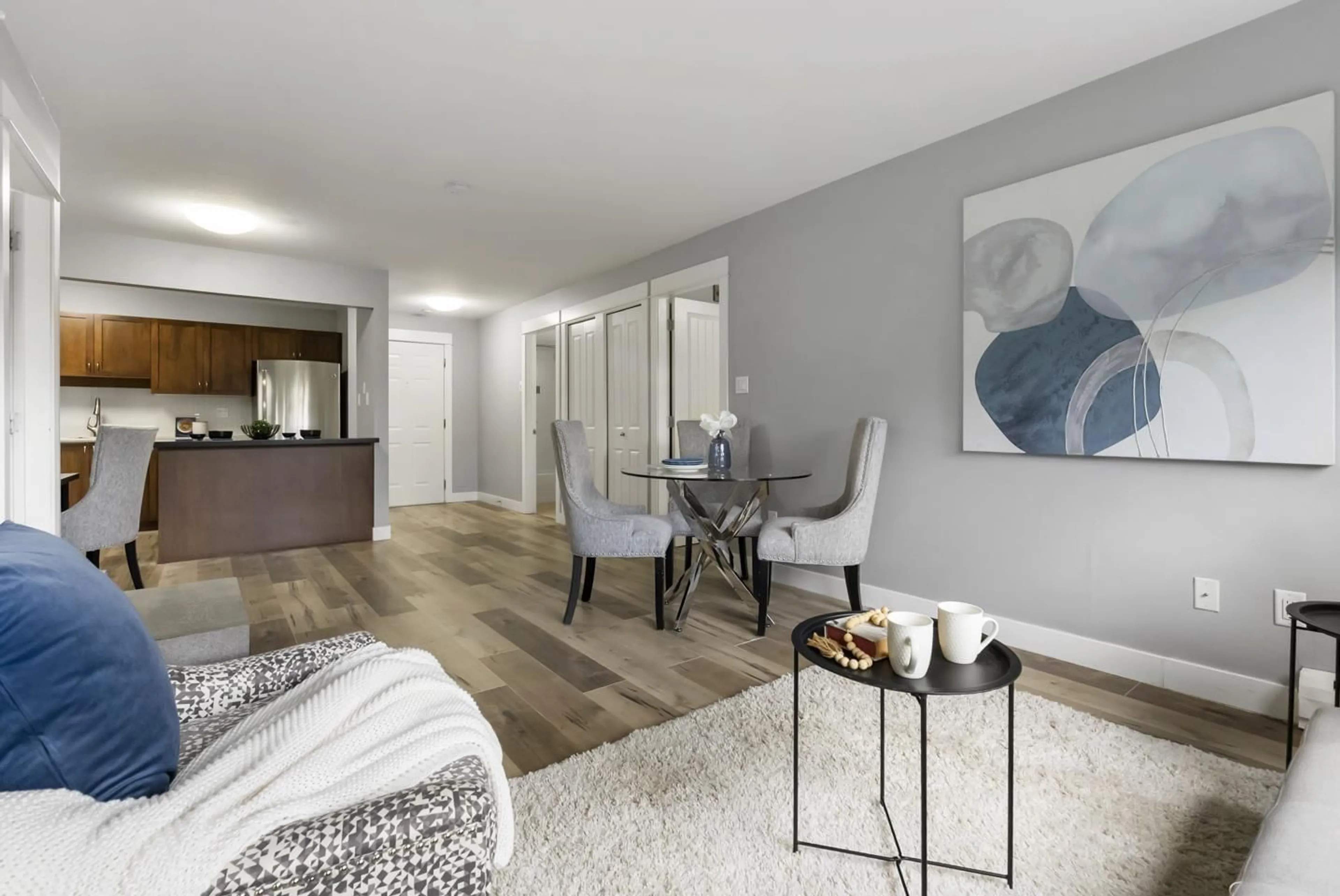 Living room with furniture, wood/laminate floor for 118 - 32725 GEORGE FERGUSON, Abbotsford British Columbia V2T5M5