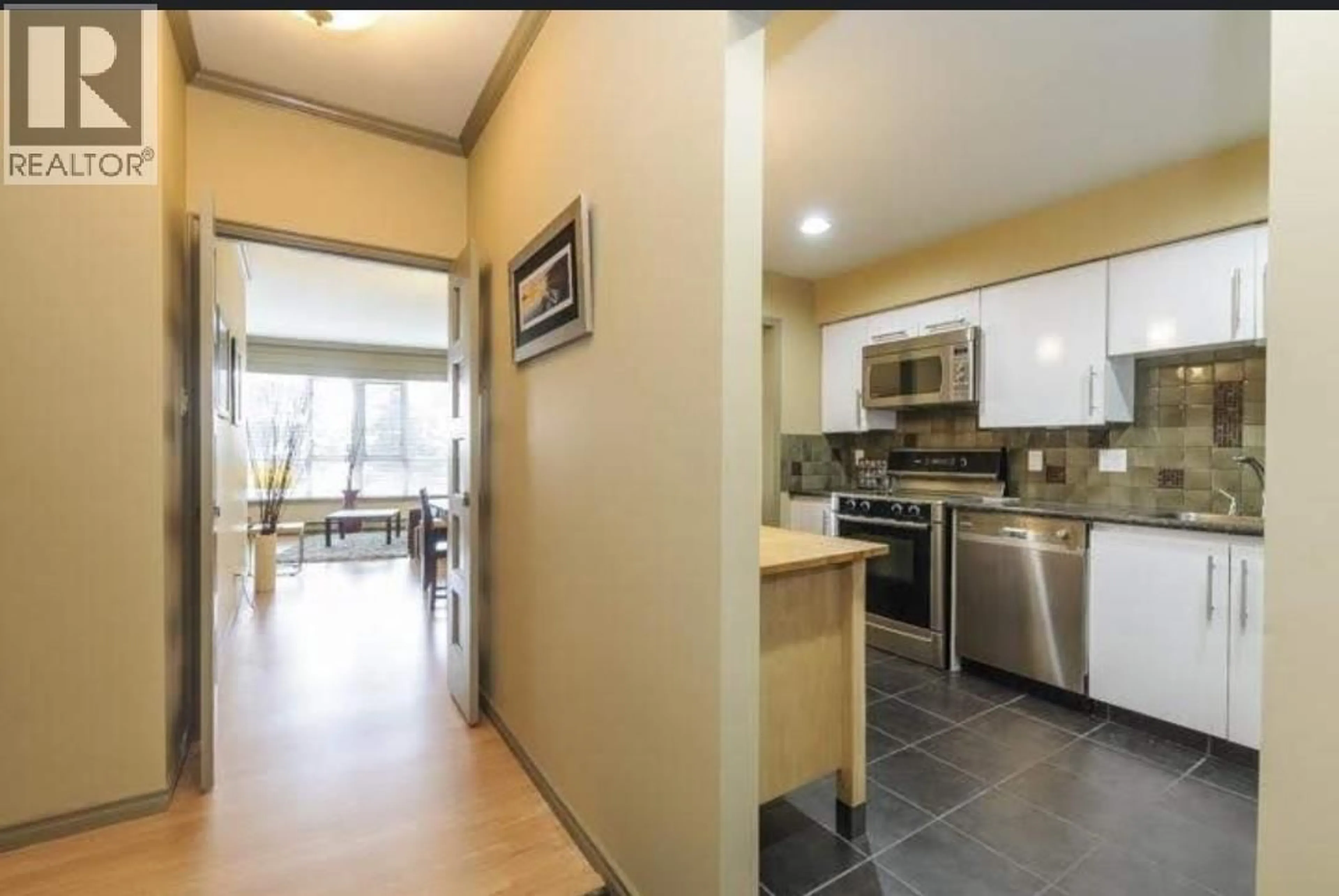 Open concept kitchen, ceramic/tile floor for 402 - 6888 STATION HILL DRIVE, Burnaby British Columbia V3N4X5