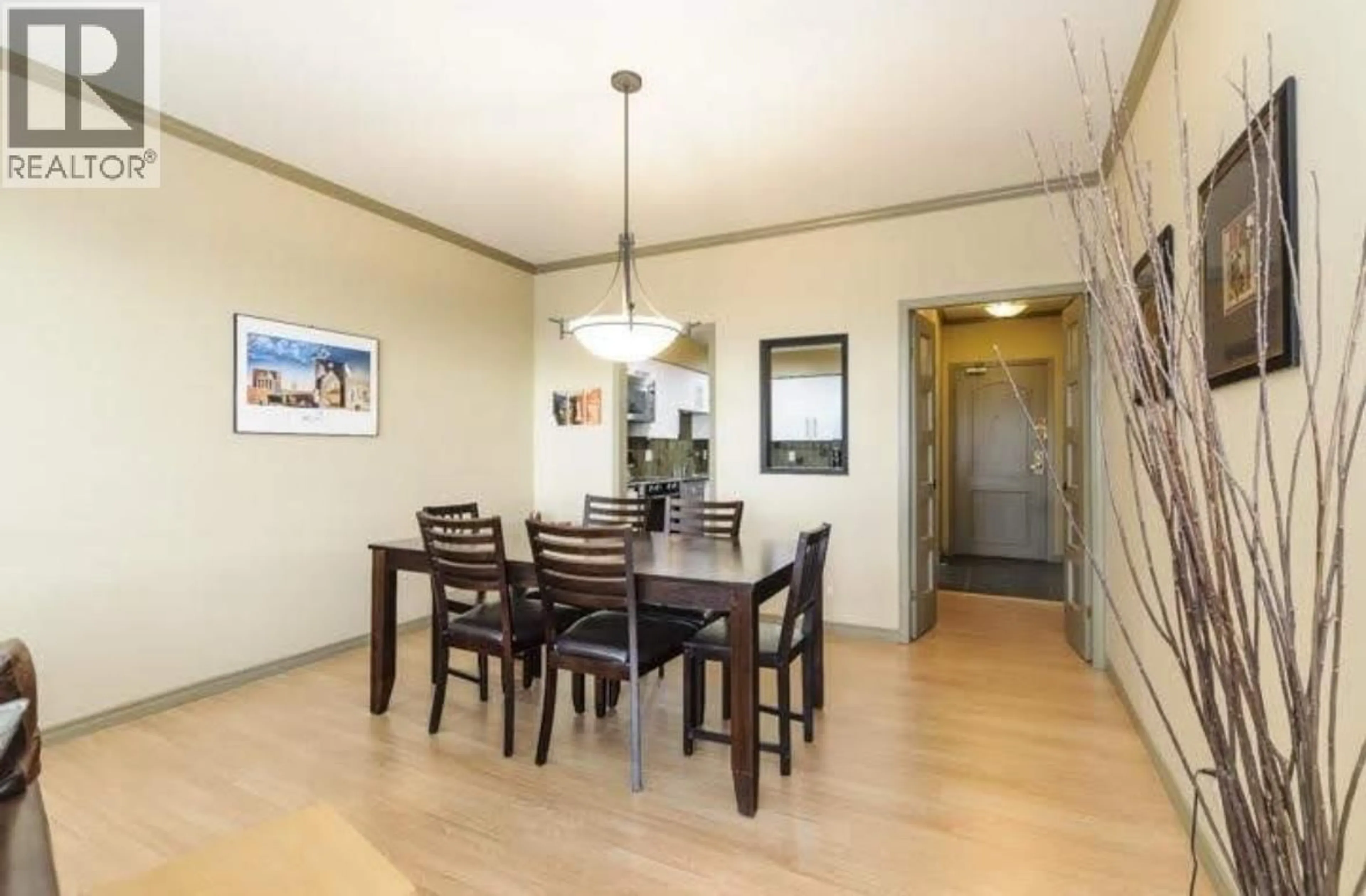 Dining room, wood/laminate floor for 402 - 6888 STATION HILL DRIVE, Burnaby British Columbia V3N4X5