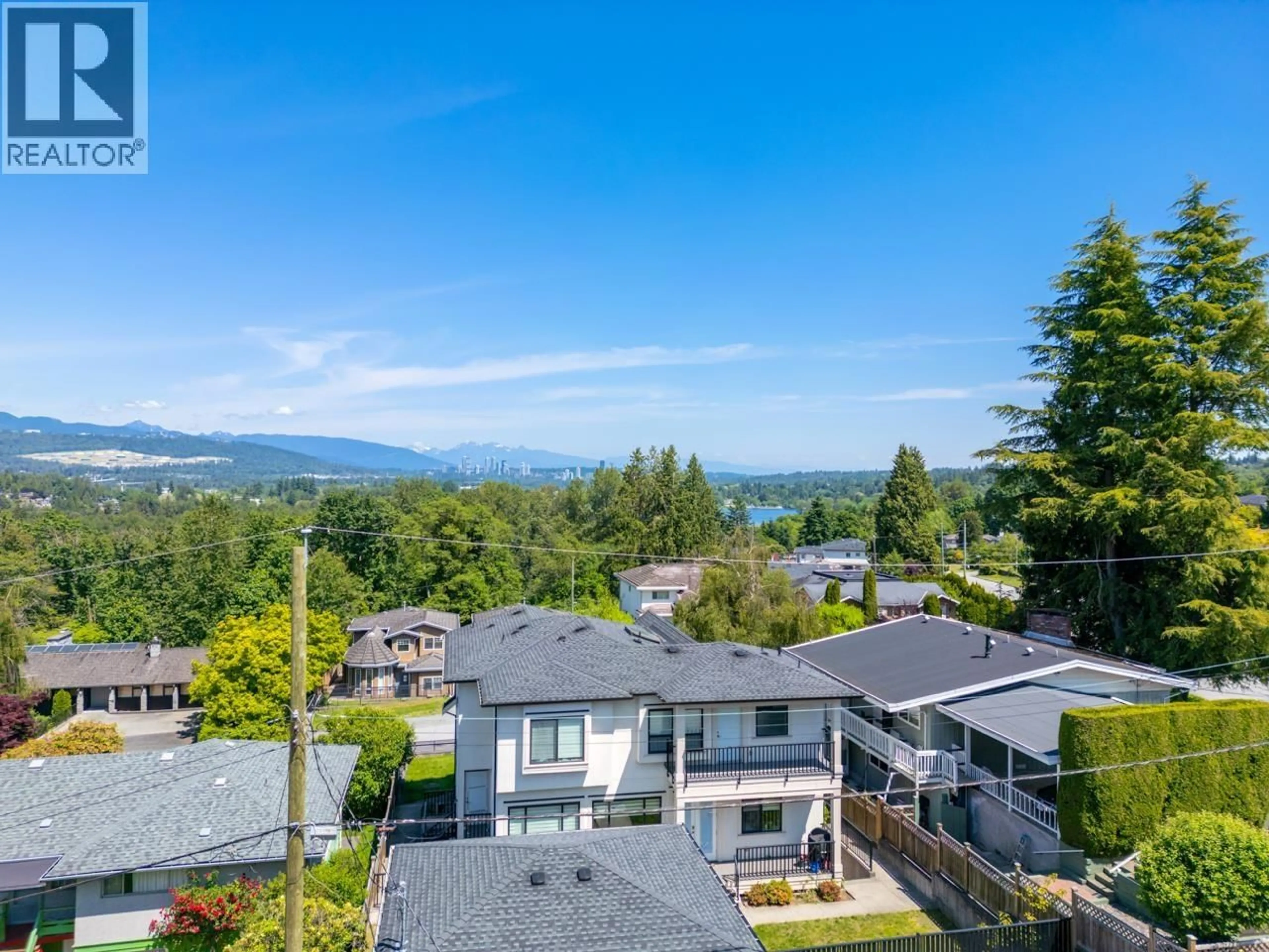 A pic from outside/outdoor area/front of a property/back of a property/a pic from drone, mountain view for 4971 BUXTON STREET, Burnaby British Columbia V5H1J4