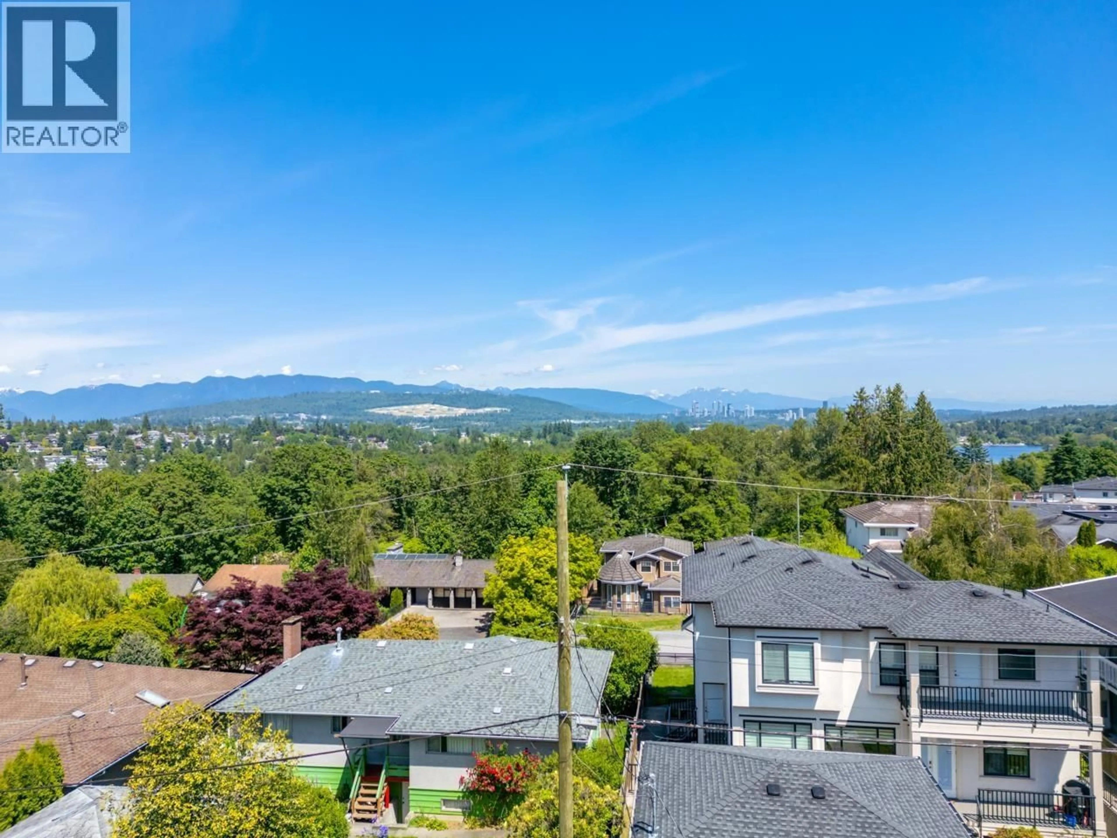 A pic from outside/outdoor area/front of a property/back of a property/a pic from drone, mountain view for 4971 BUXTON STREET, Burnaby British Columbia V5H1J4