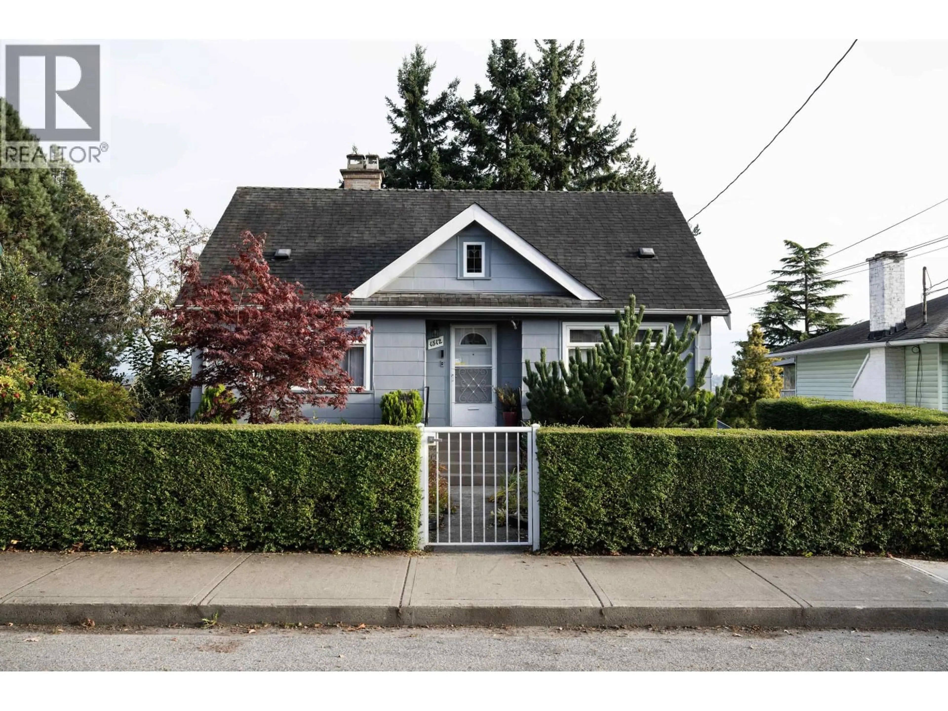 Home with vinyl exterior material, street for 1512 SEVENTH AVENUE, New Westminster British Columbia V3M2K3
