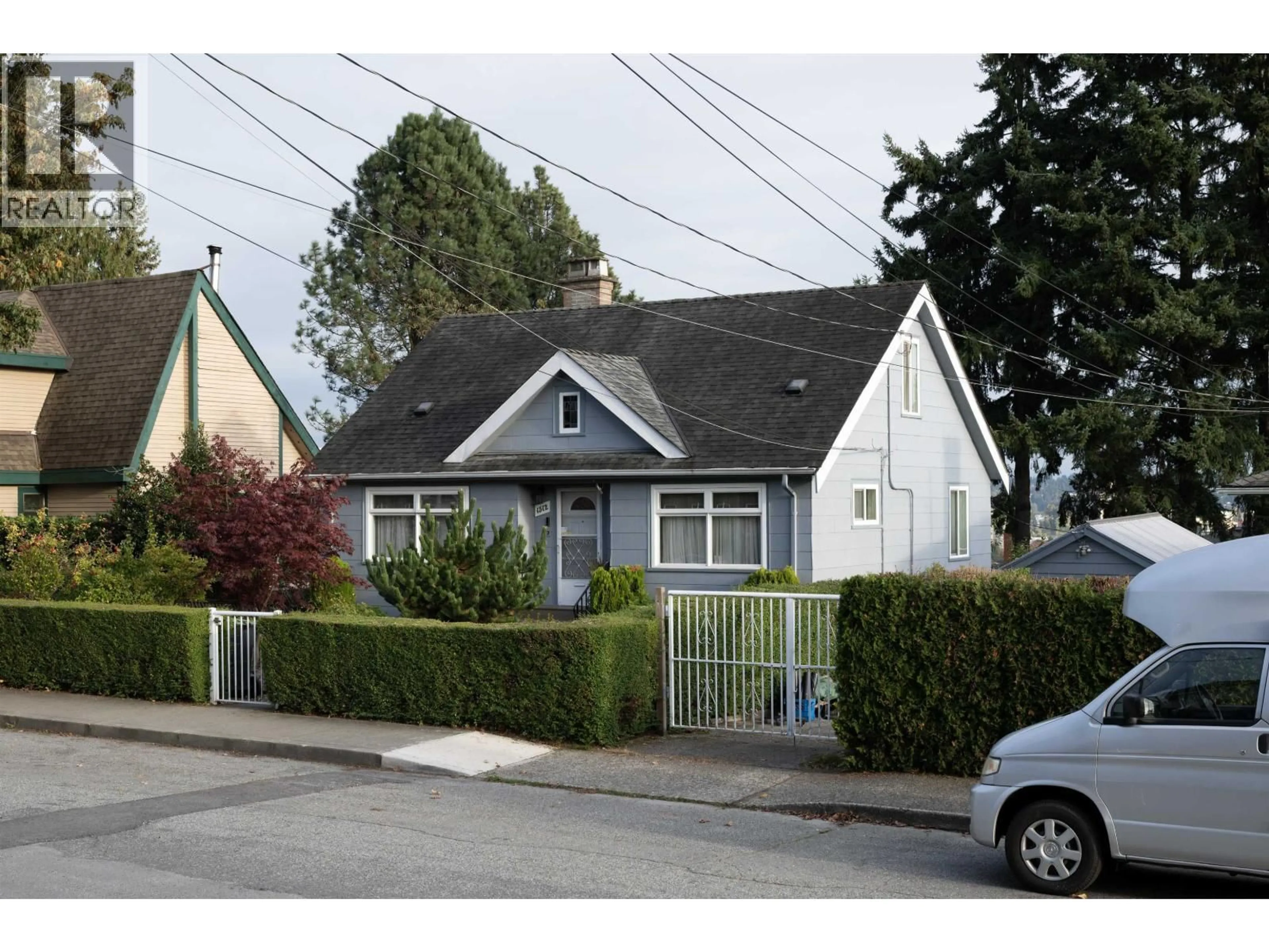 Home with vinyl exterior material, street for 1512 SEVENTH AVENUE, New Westminster British Columbia V3M2K3