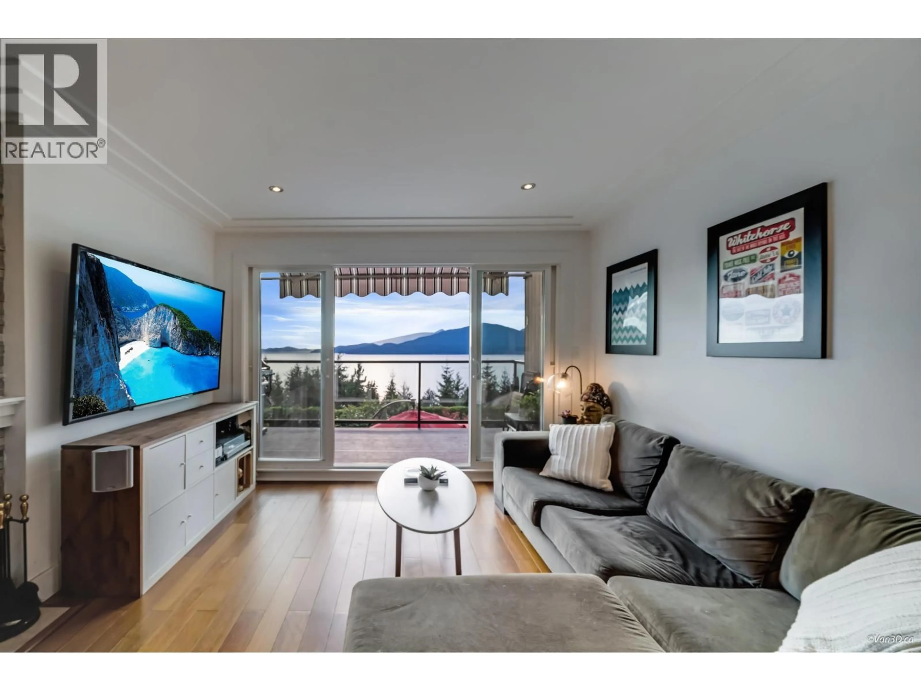Living room with furniture, wood/laminate floor for 430 CROSSCREEK ROAD, Lions Bay British Columbia V0N2E0