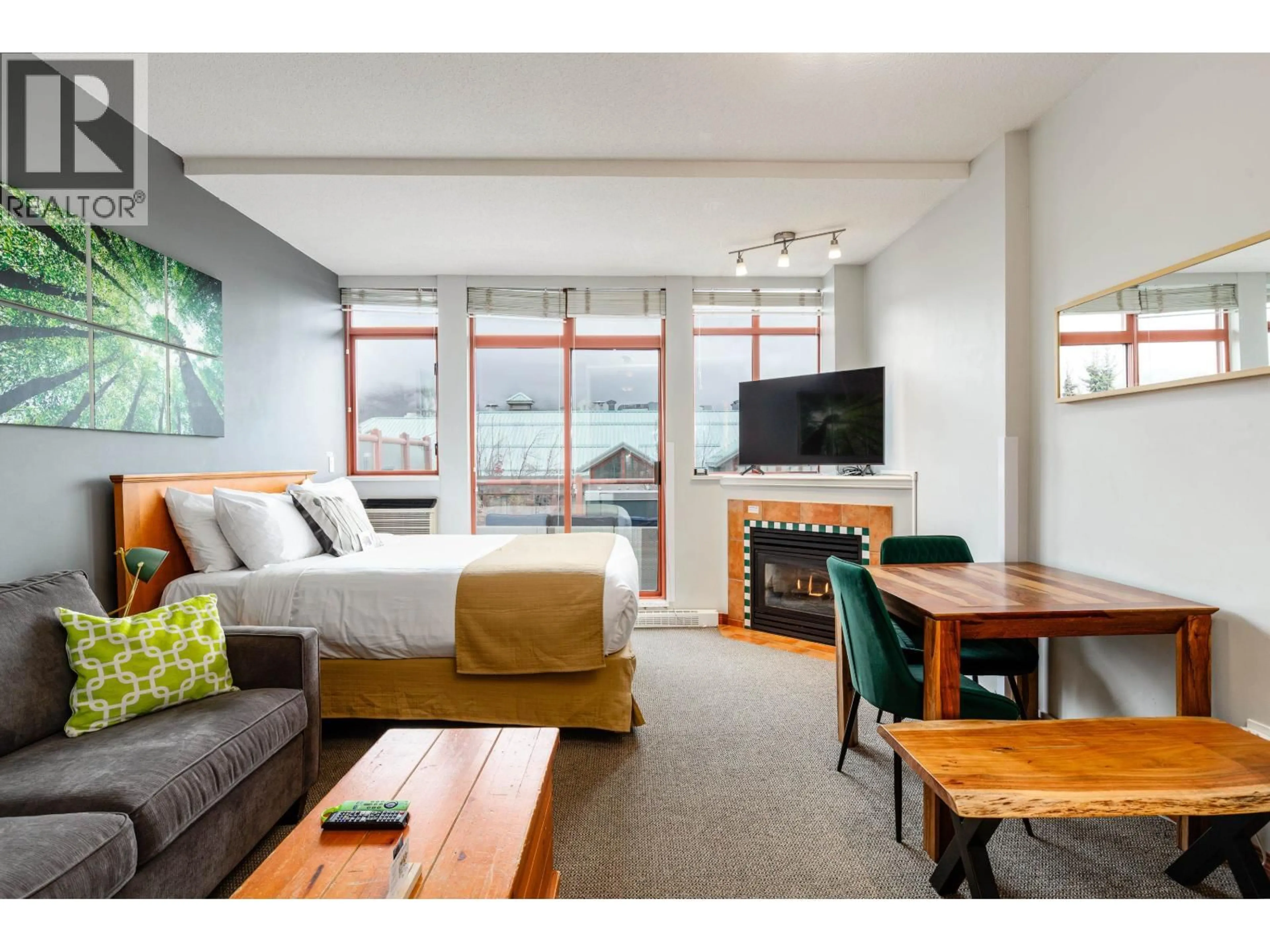 Living room with furniture, wood/laminate floor for 419 - 4369 MAIN STREET, Whistler British Columbia V8E1B7