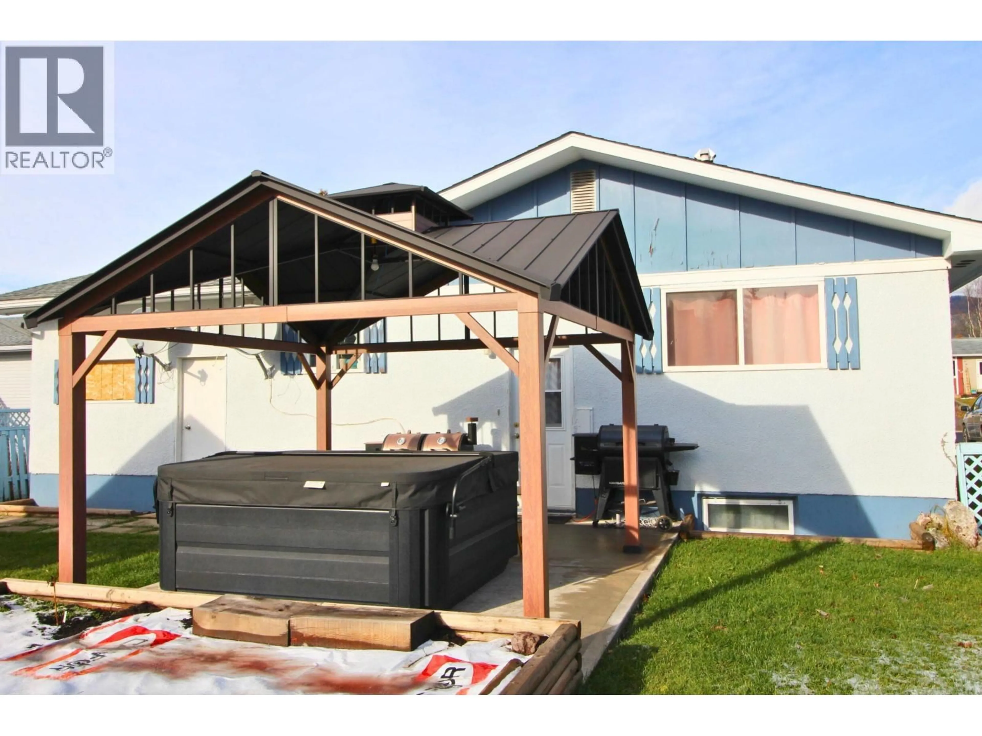 Home with vinyl exterior material, street for 3290 GILLESPIE ROAD, Houston British Columbia V0J1Z0