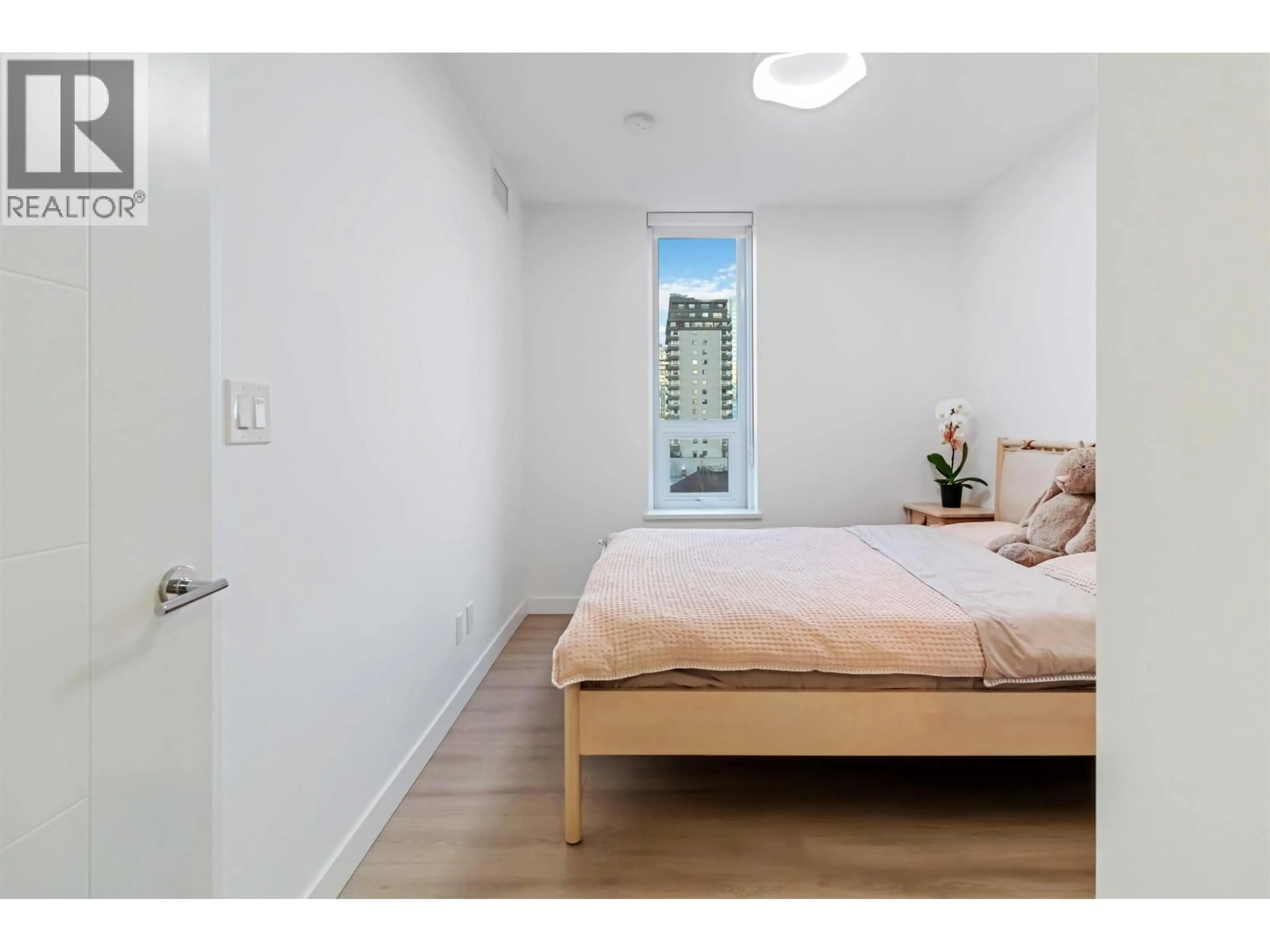 Bedroom with bed, wood/laminate floor for 1204 - 823 CARNARVON STREET, New Westminster British Columbia V3M0N5