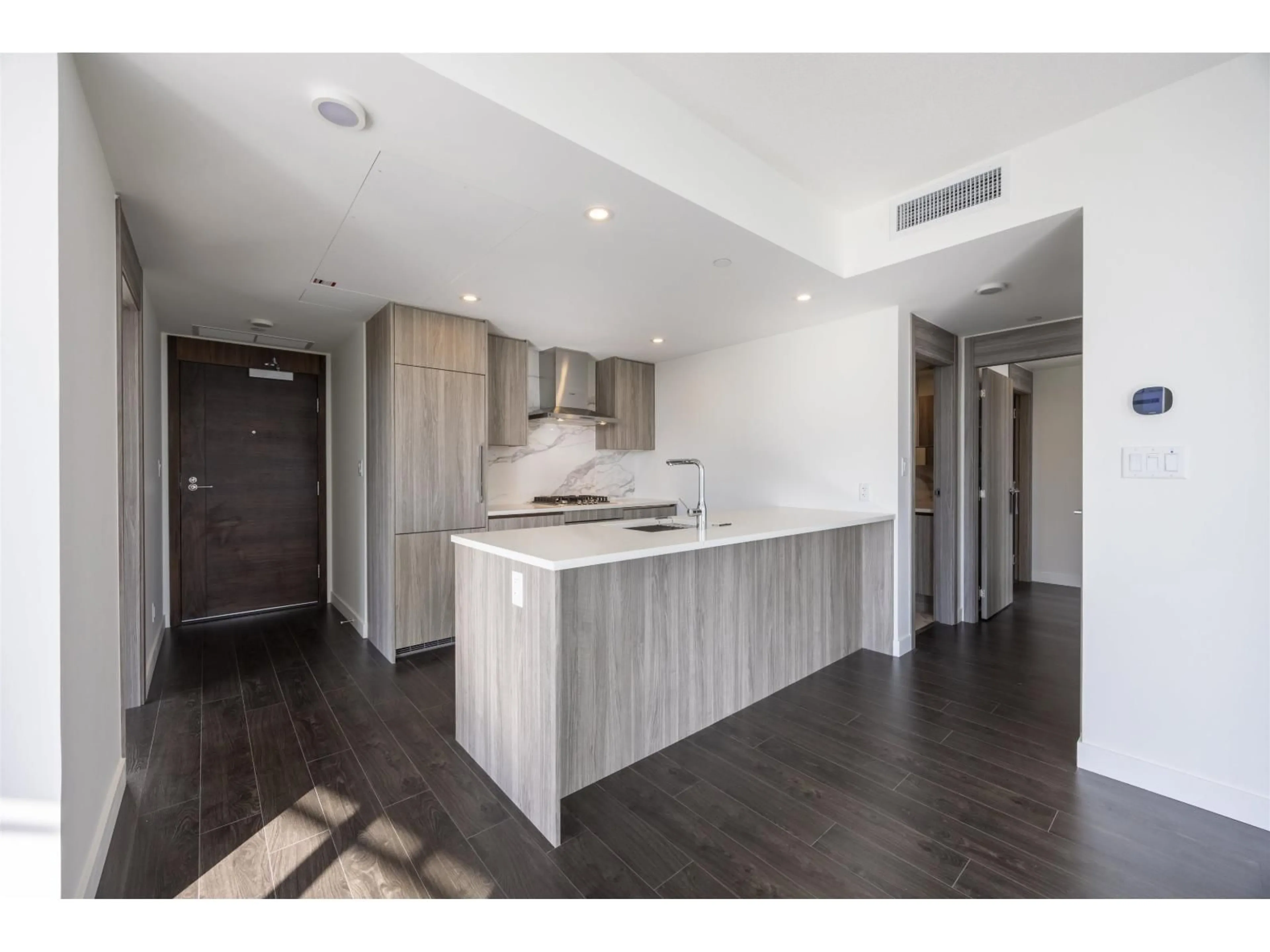 Open concept kitchen, wood/laminate floor for 3107 - 13768 100, Surrey British Columbia V3T0V2