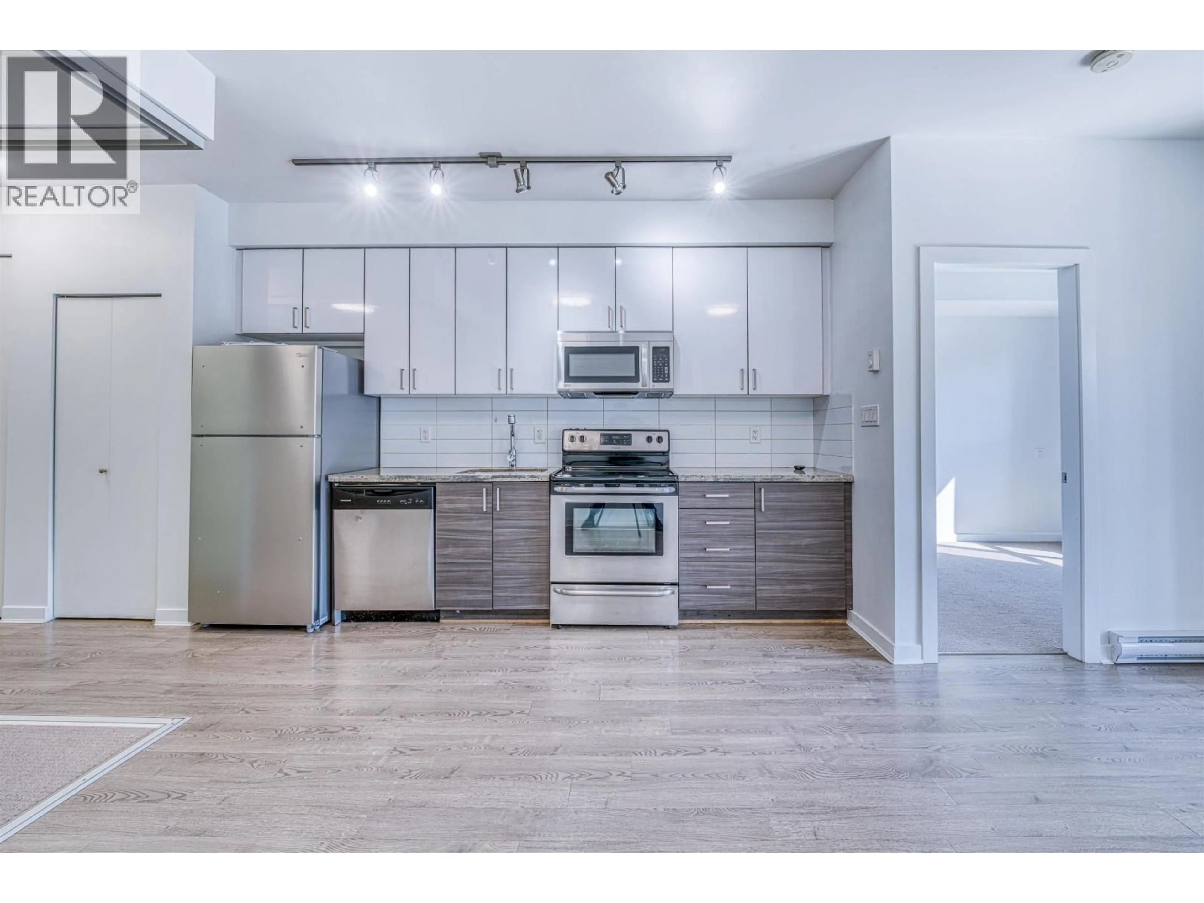 Open concept kitchen, unknown for 308 - 3688 INVERNESS STREET, Vancouver British Columbia V5V0C5