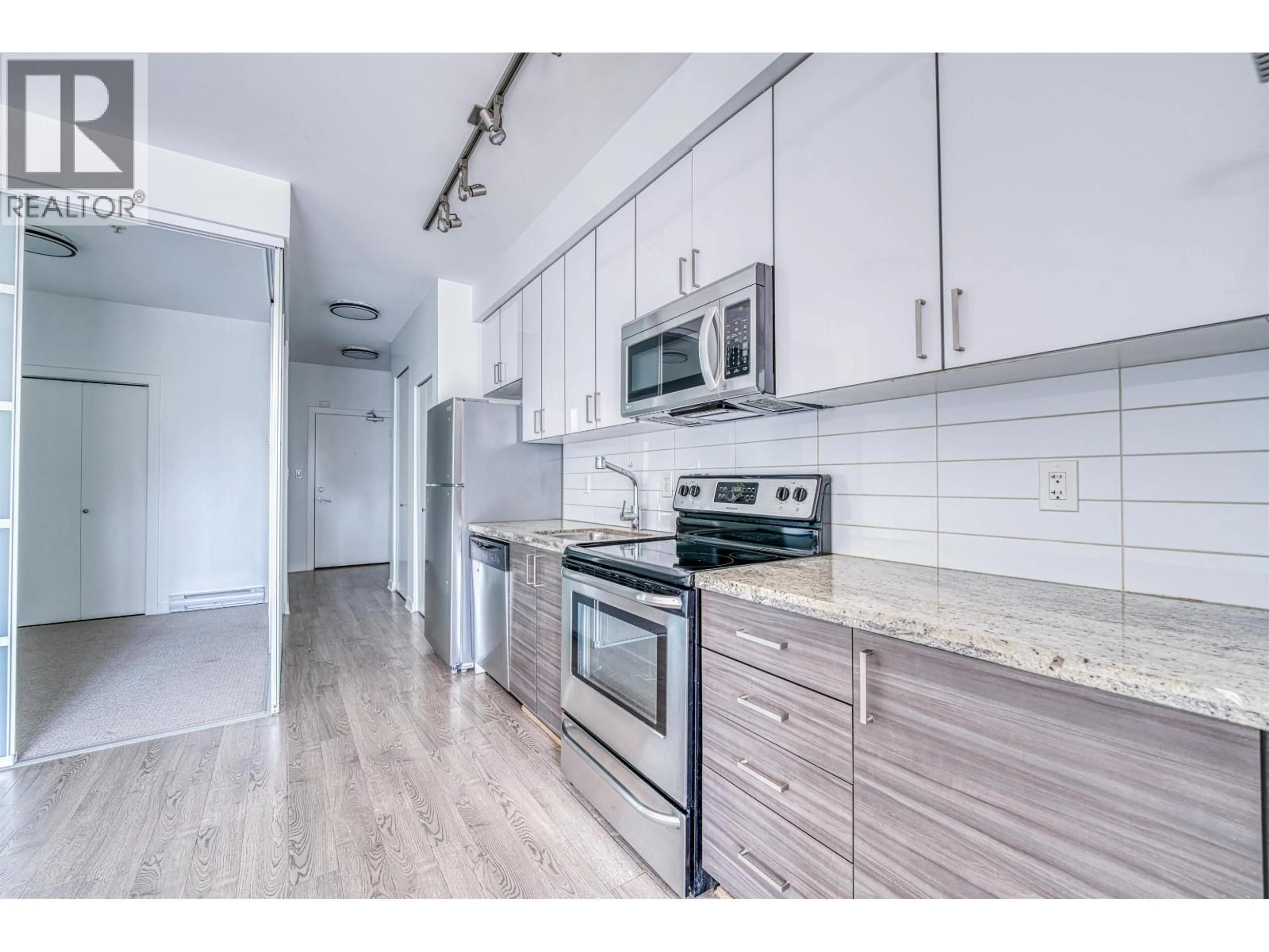Standard kitchen, wood/laminate floor for 308 - 3688 INVERNESS STREET, Vancouver British Columbia V5V0C5