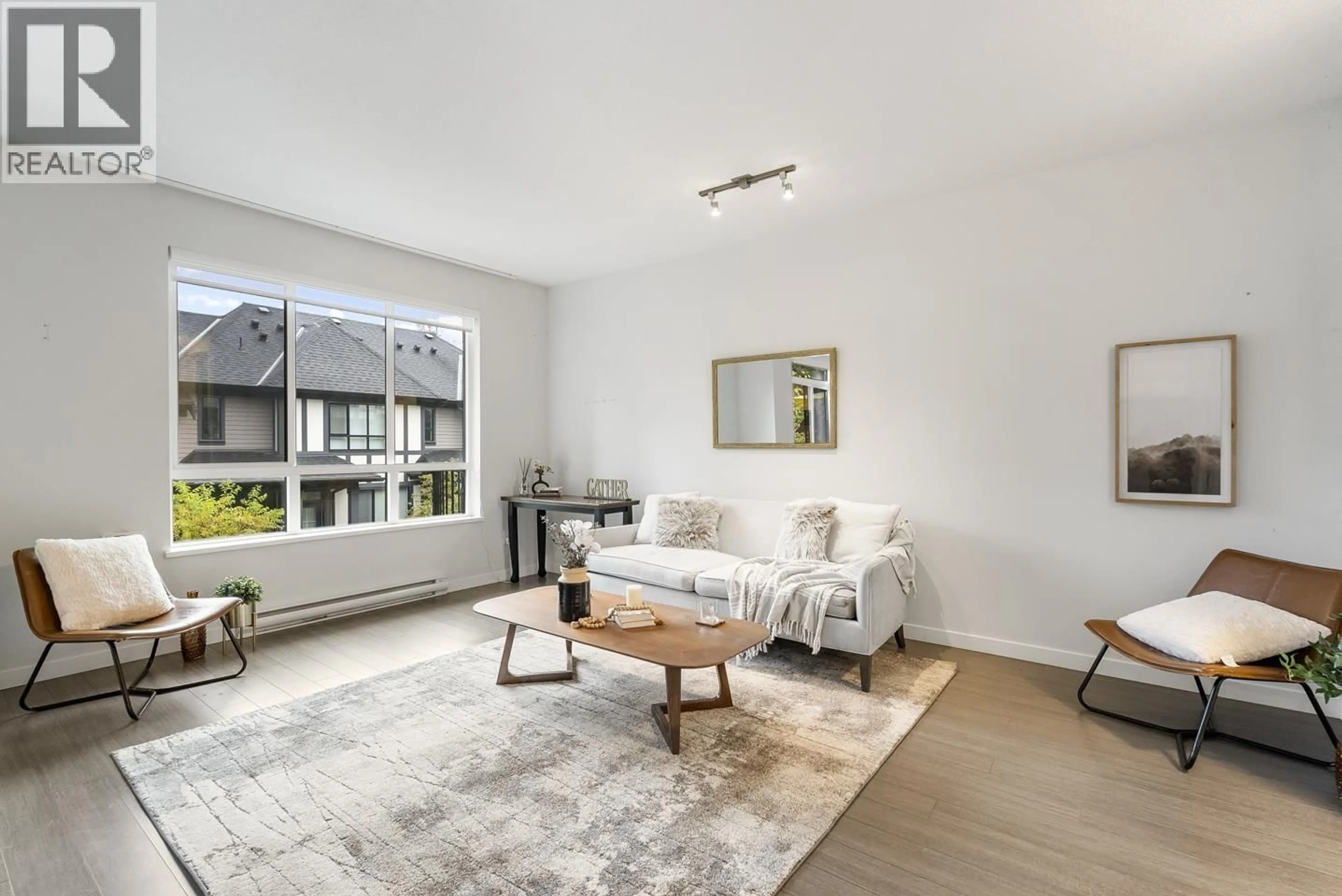 Living room with furniture, unknown for 153 - 3500 BURKE VILLAGE PROMENADE, Coquitlam British Columbia V3E0N2