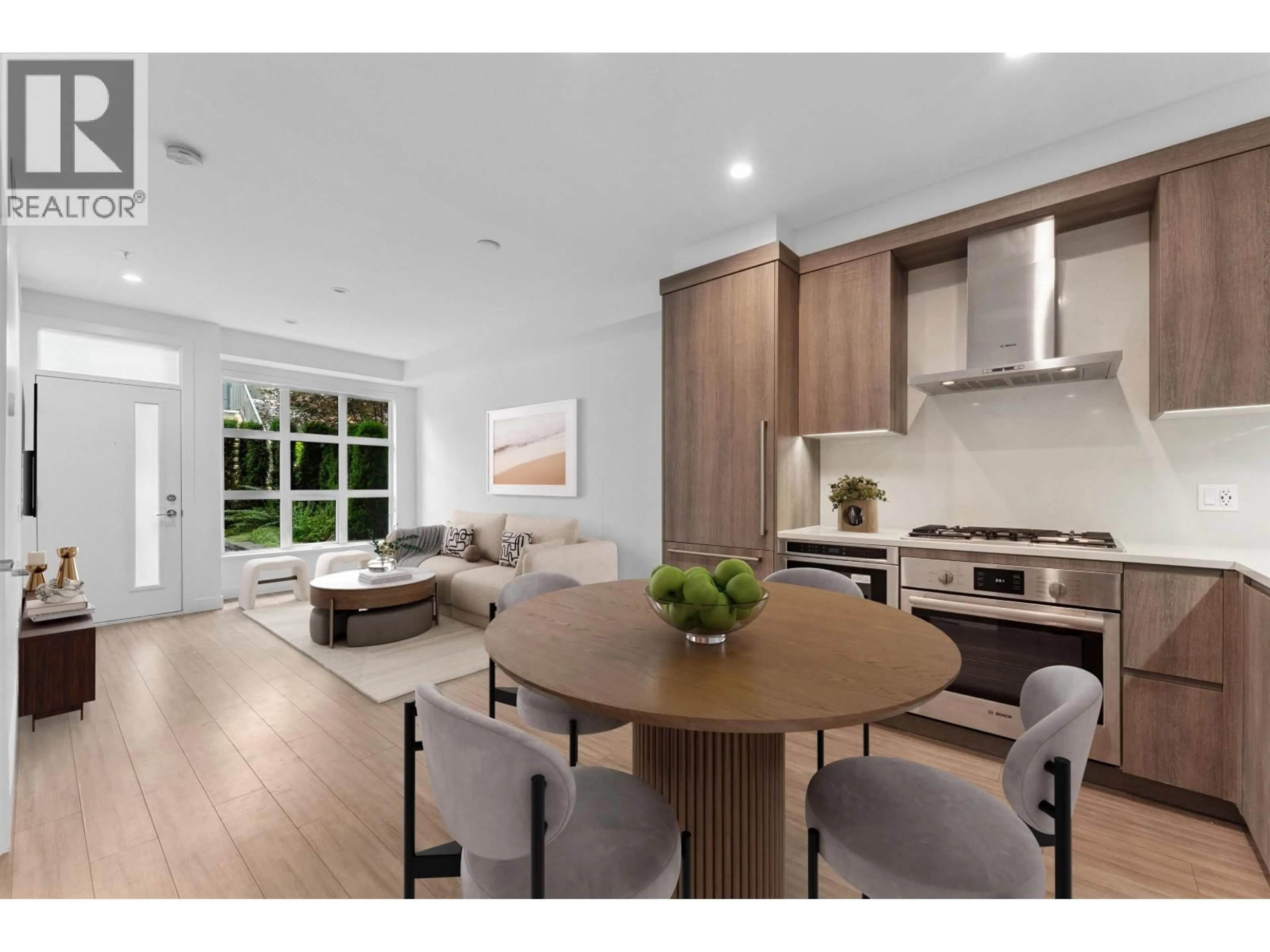 Open concept kitchen, wood/laminate floor for 111 - 2060 CURLING ROAD, North Vancouver British Columbia V7P1X4