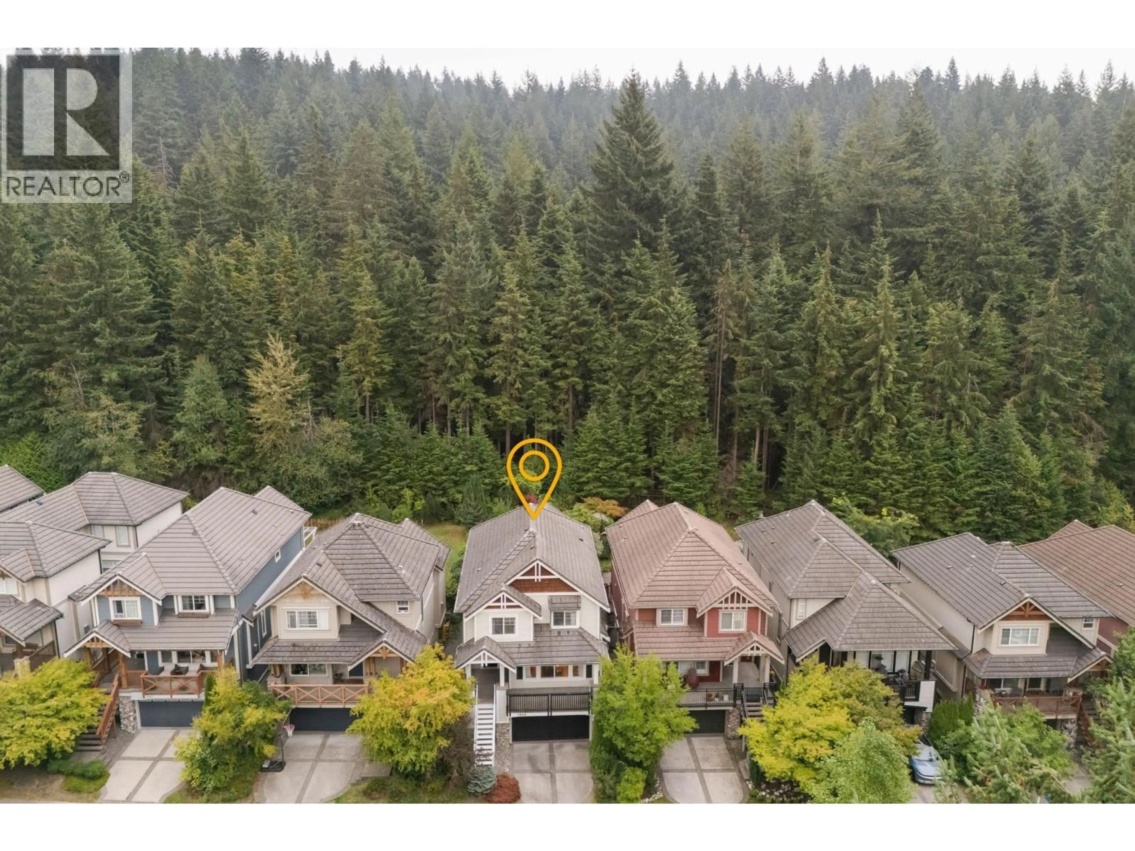A pic from outside/outdoor area/front of a property/back of a property/a pic from drone, forest/trees view for 1855 PARKWAY BOULEVARD, Coquitlam British Columbia V3E3L4