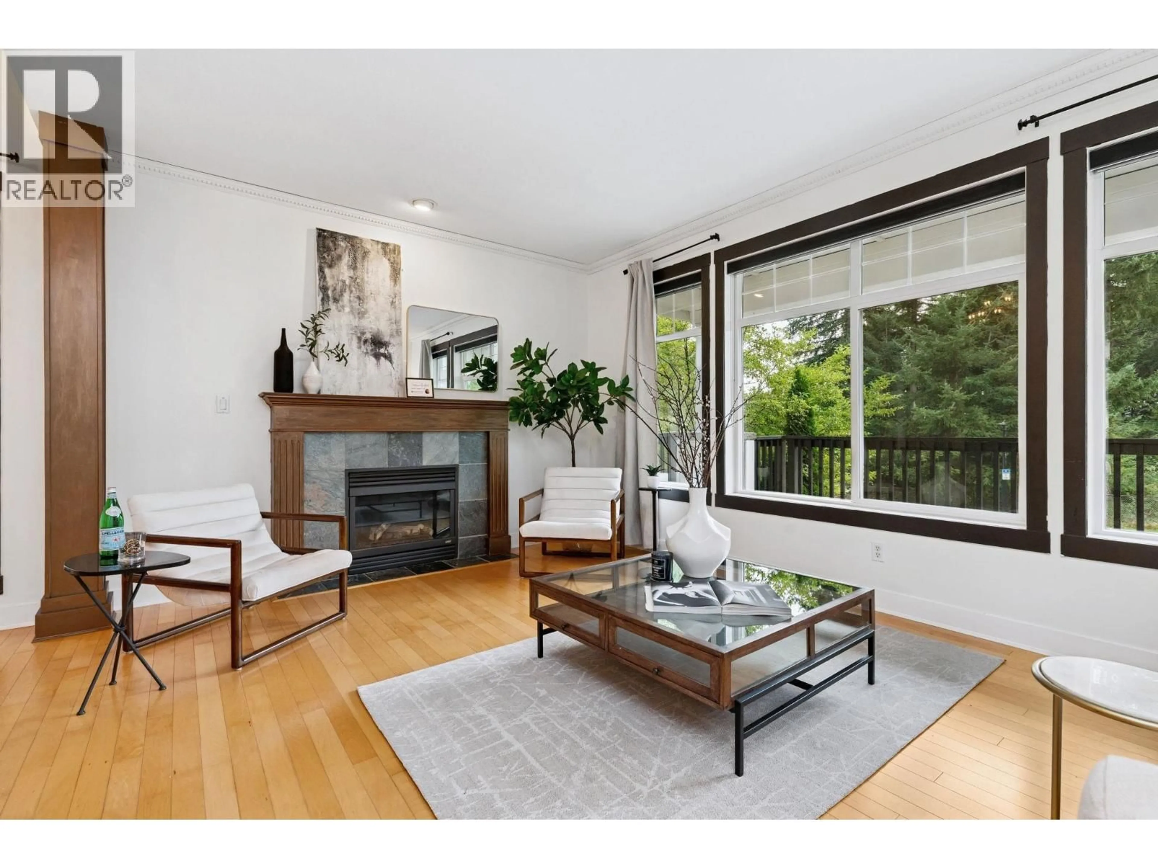 Living room with furniture, wood/laminate floor for 1855 PARKWAY BOULEVARD, Coquitlam British Columbia V3E3L4