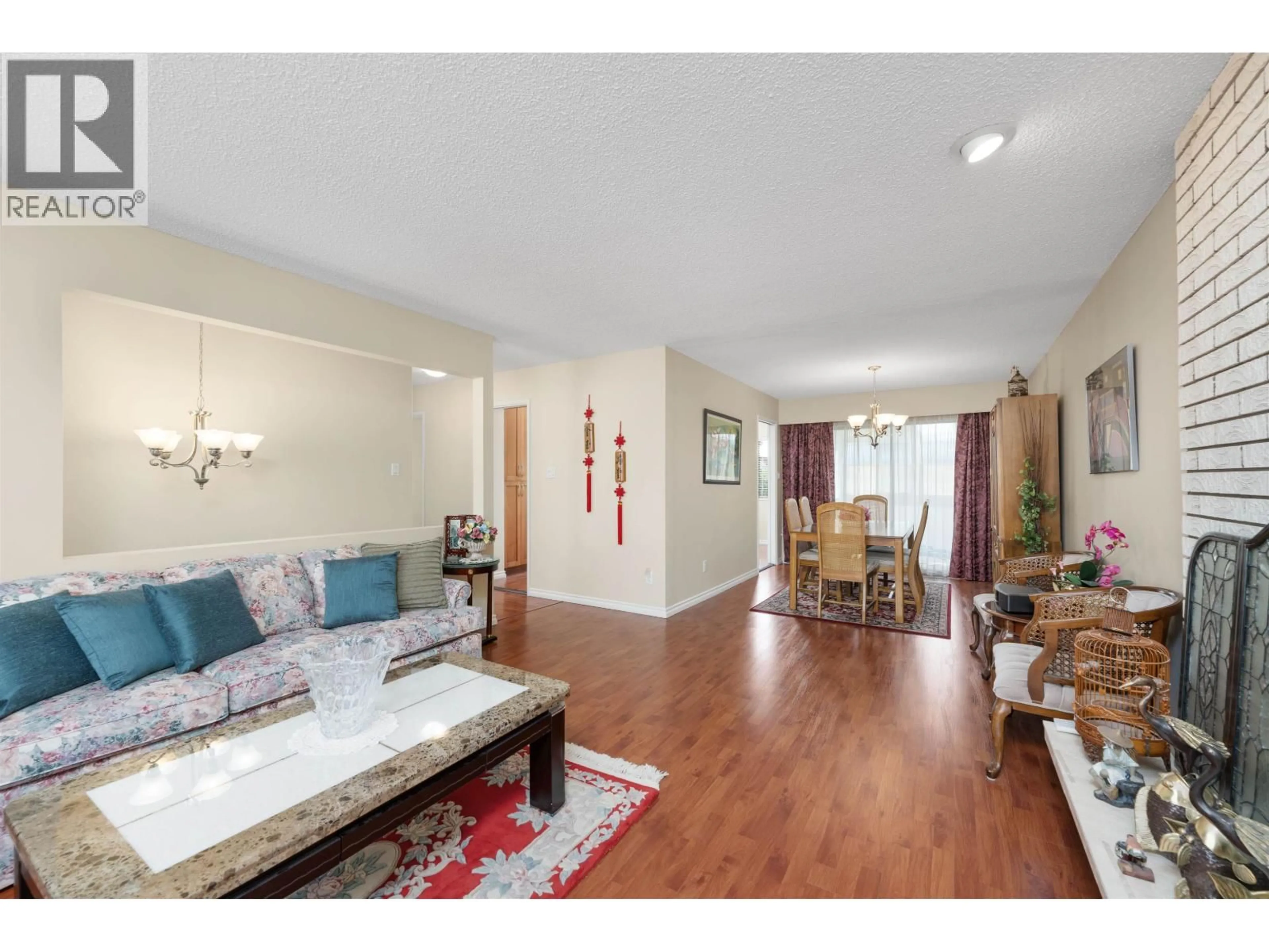 Living room with furniture, wood/laminate floor for 8680 DEMOREST DRIVE, Richmond British Columbia V7A4M1