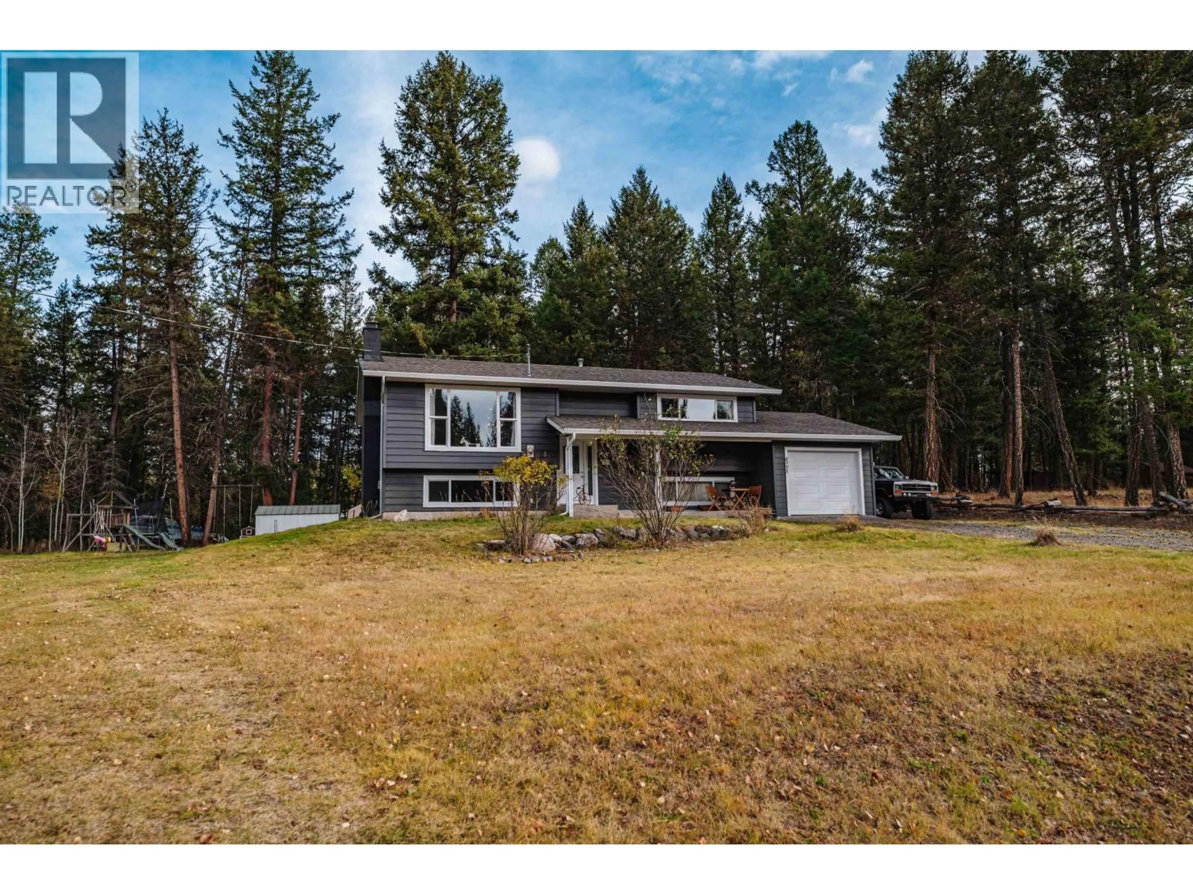 A pic from outside/outdoor area/front of a property/back of a property/a pic from drone, unknown for 4995 SMITH ROAD, 108 Mile Ranch British Columbia V0K2Z0