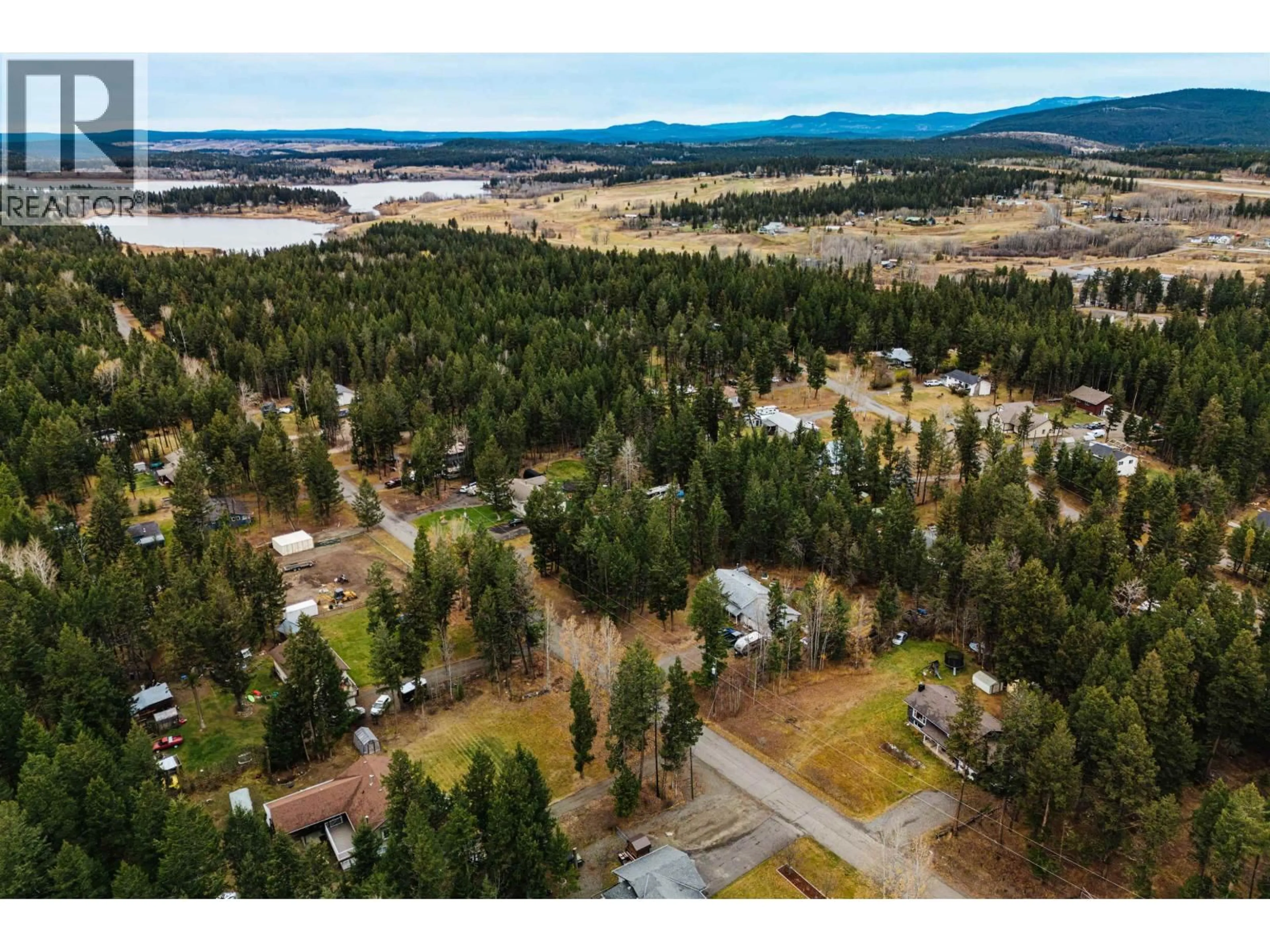 A pic from outside/outdoor area/front of a property/back of a property/a pic from drone, forest/trees view for 4995 SMITH ROAD, 108 Mile Ranch British Columbia V0K2Z0