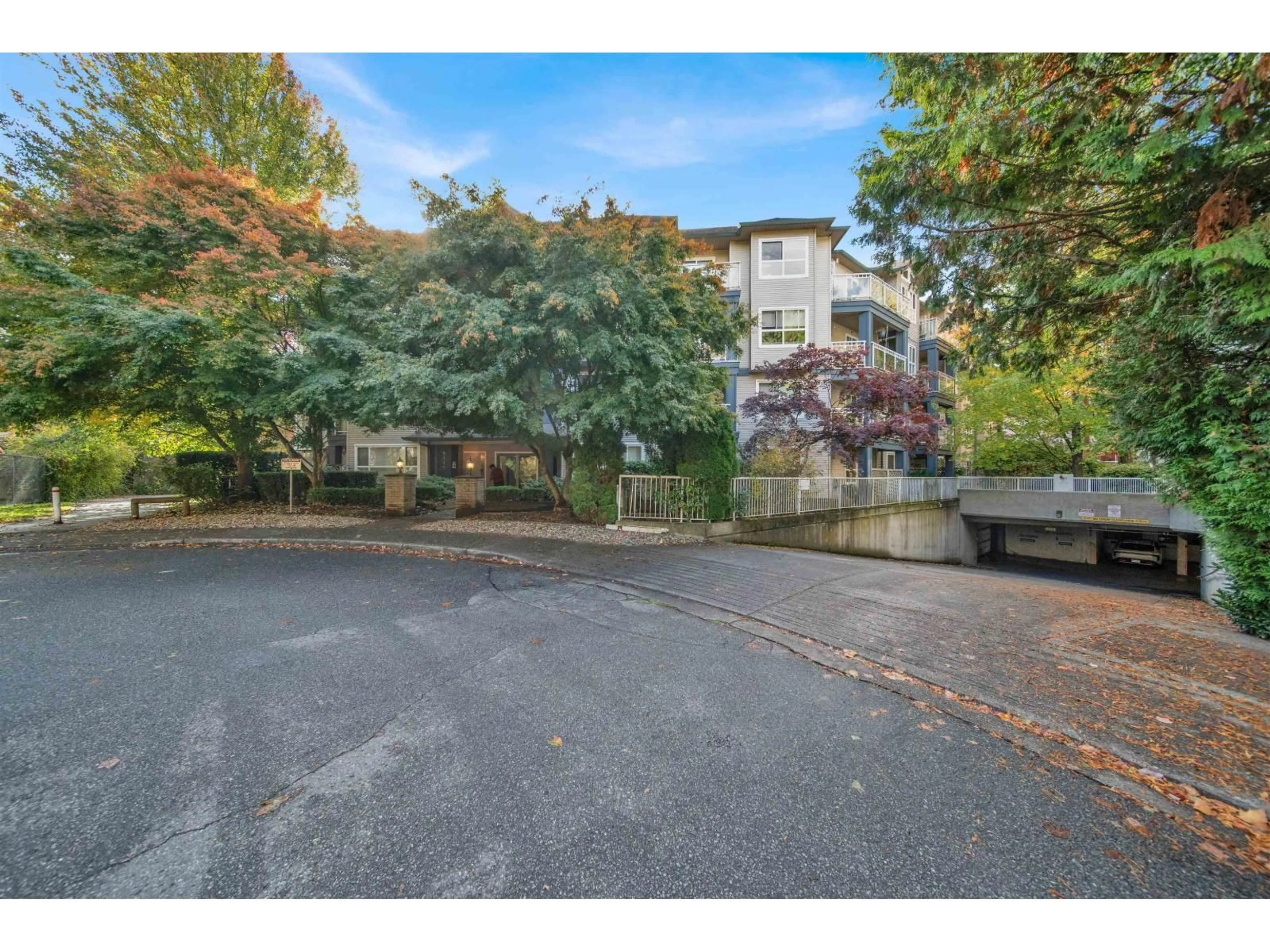 A pic from outside/outdoor area/front of a property/back of a property/a pic from drone, street for 210 - 8115 121A, Surrey British Columbia V3W1J2