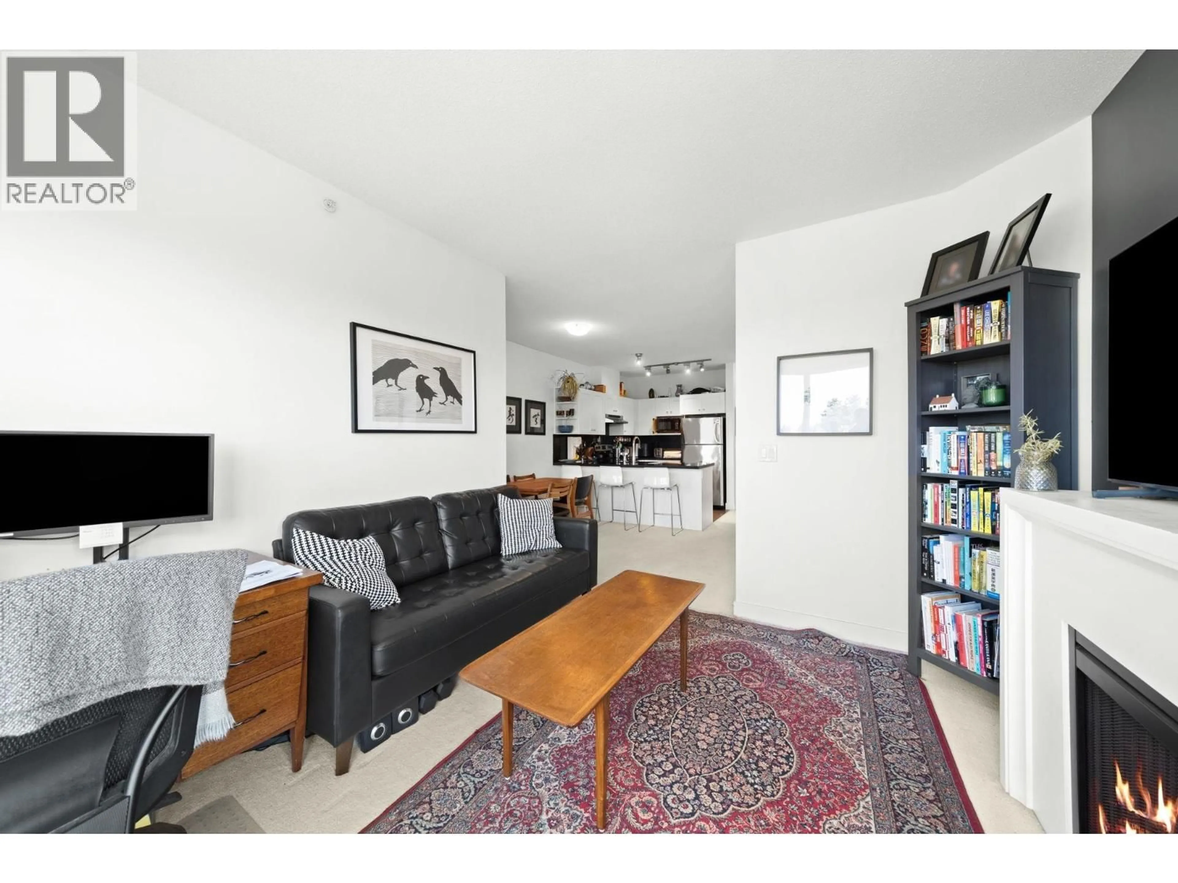 Living room with furniture, unknown for 424 - 4550 FRASER STREET, Vancouver British Columbia V5V4G8