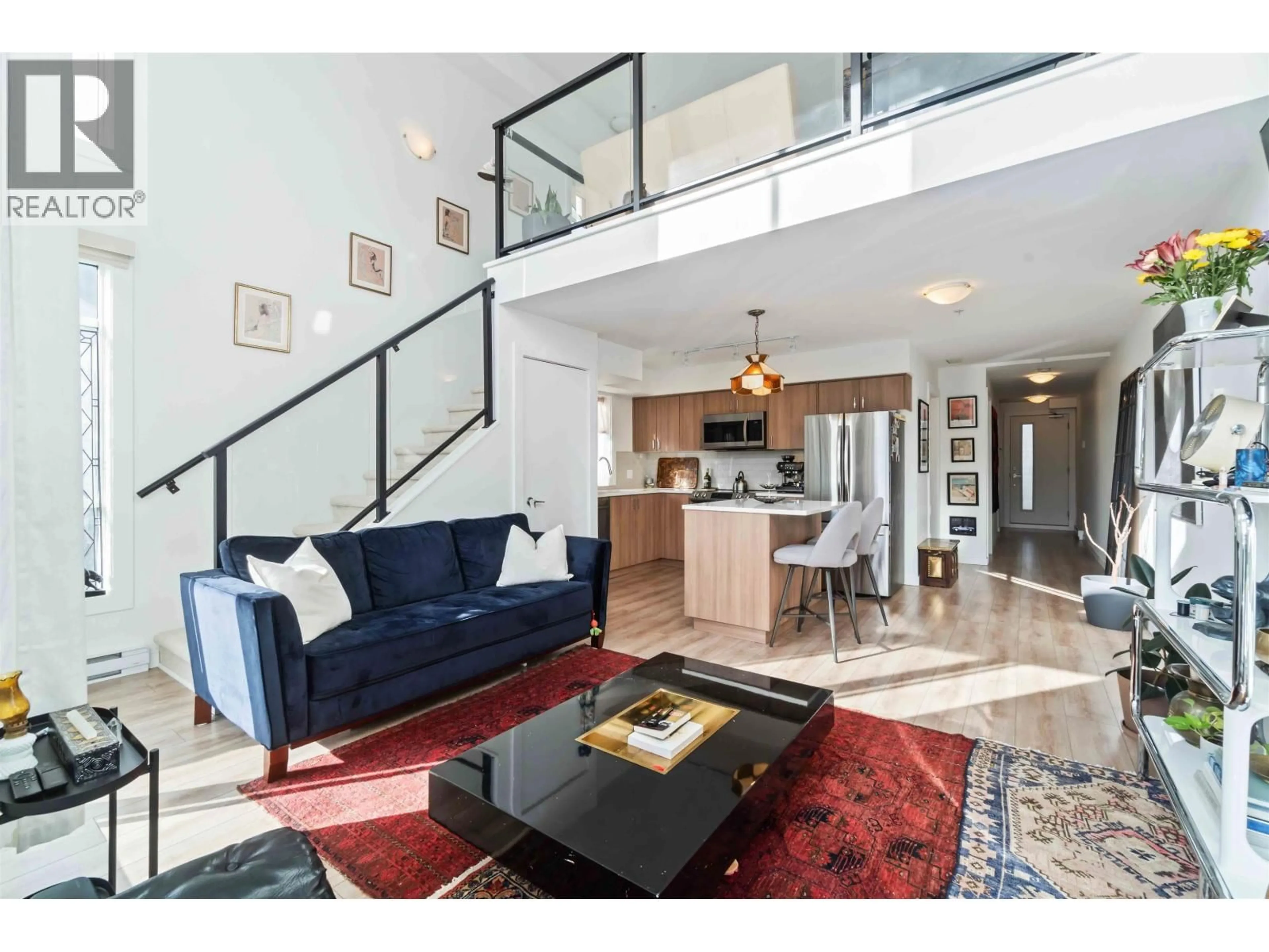 Living room with furniture, unknown for 201 - 39771 GOVERNMENT ROAD, Squamish British Columbia V8B0Z1