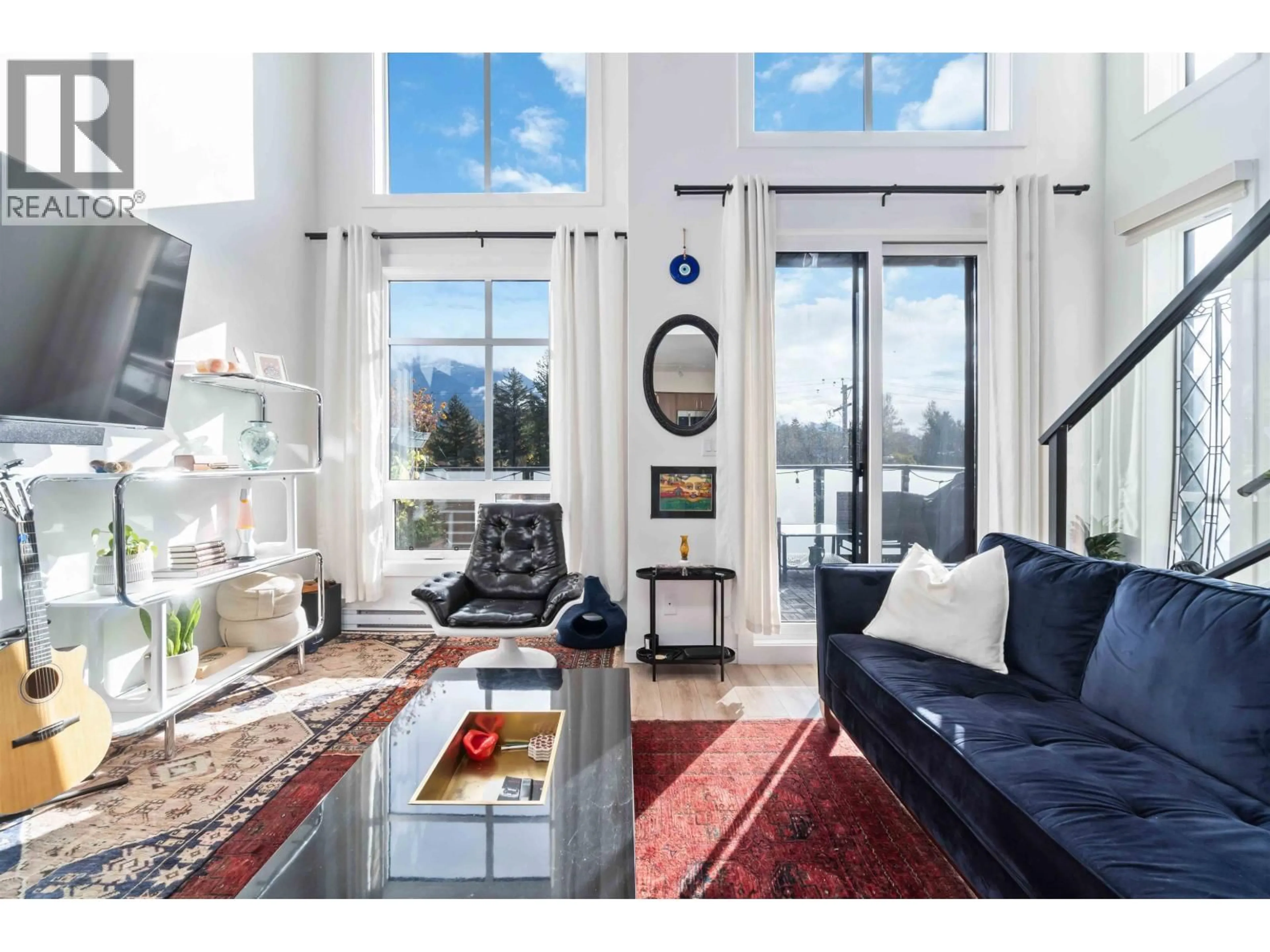 Living room with furniture, unknown for 201 - 39771 GOVERNMENT ROAD, Squamish British Columbia V8B0Z1