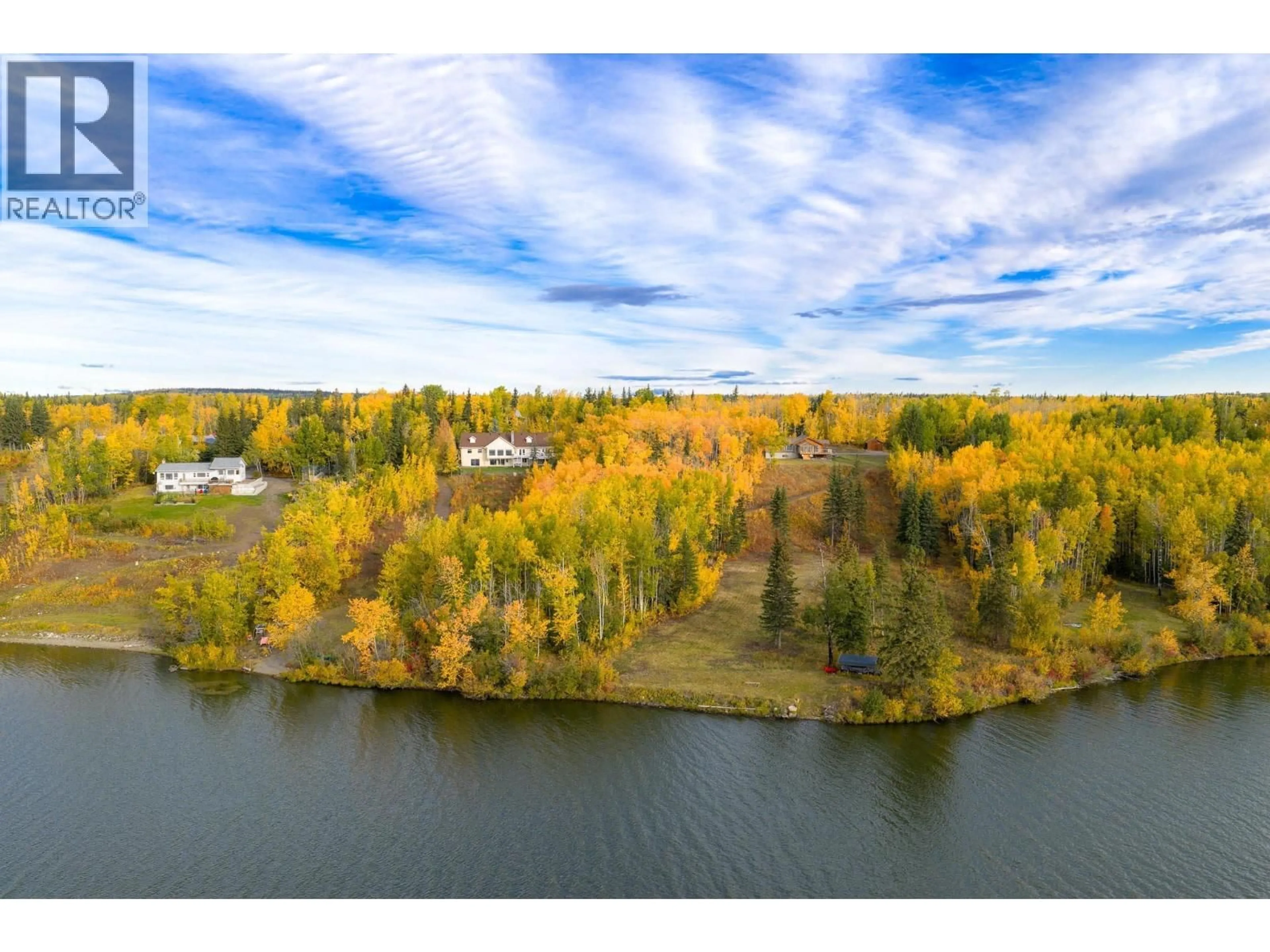 A pic from outside/outdoor area/front of a property/back of a property/a pic from drone, water/lake/river/ocean view for 8137 SINKUT LAKE ROAD, Vanderhoof British Columbia V0J3A1