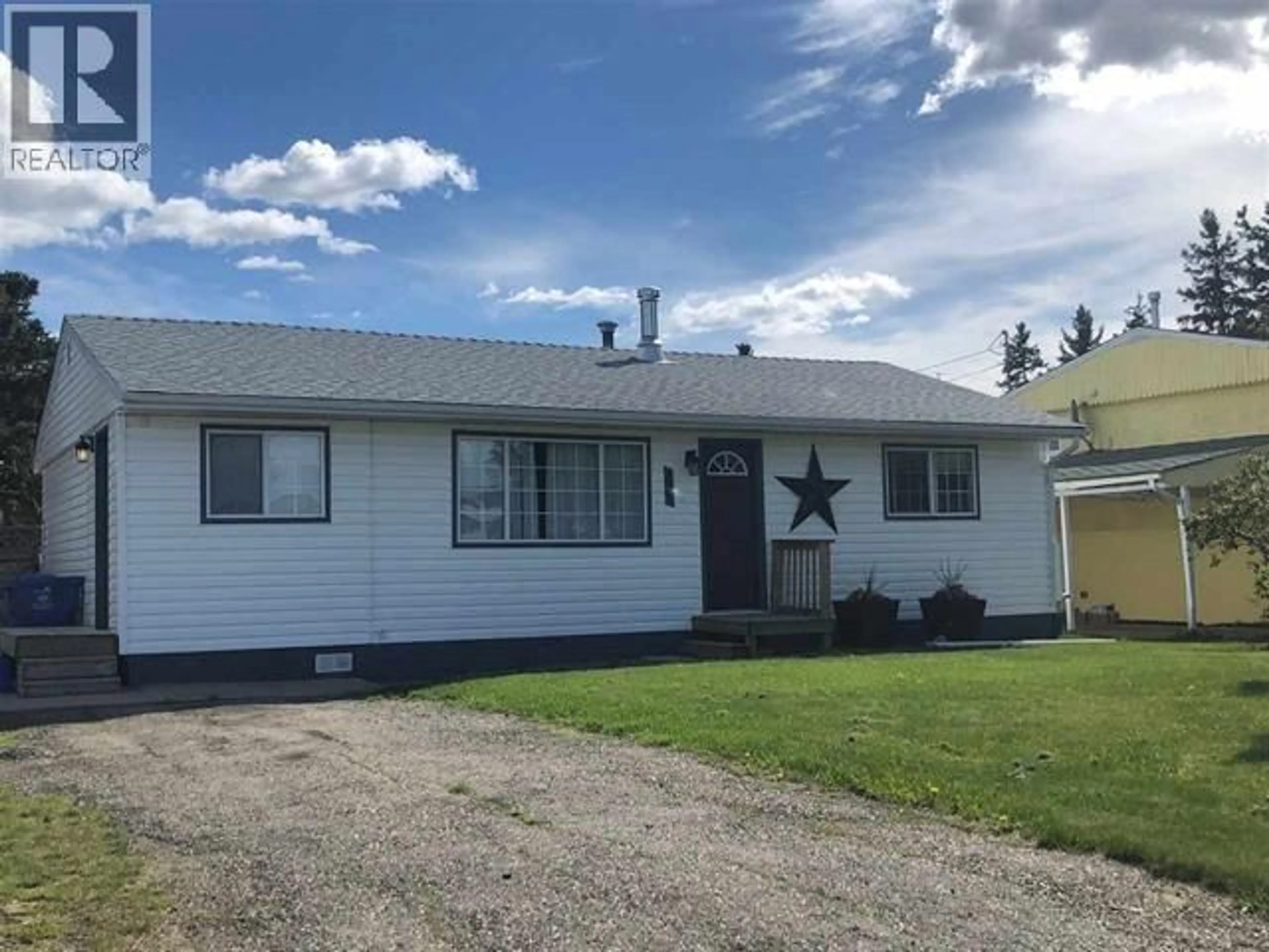 Home with vinyl exterior material, street for 9215 104 AVENUE, Fort St. John British Columbia V1J2J6