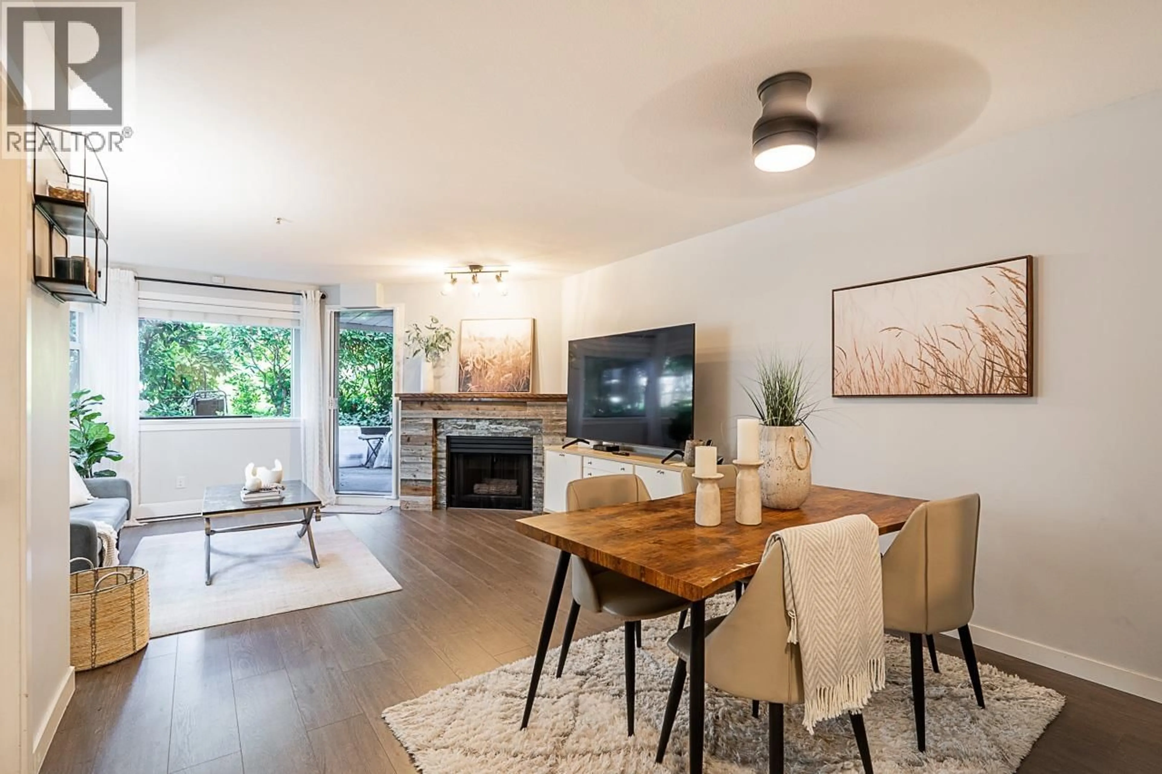 Living room with furniture, wood/laminate floor for 106 - 3628 RAE AVENUE, Vancouver British Columbia V5R2P5