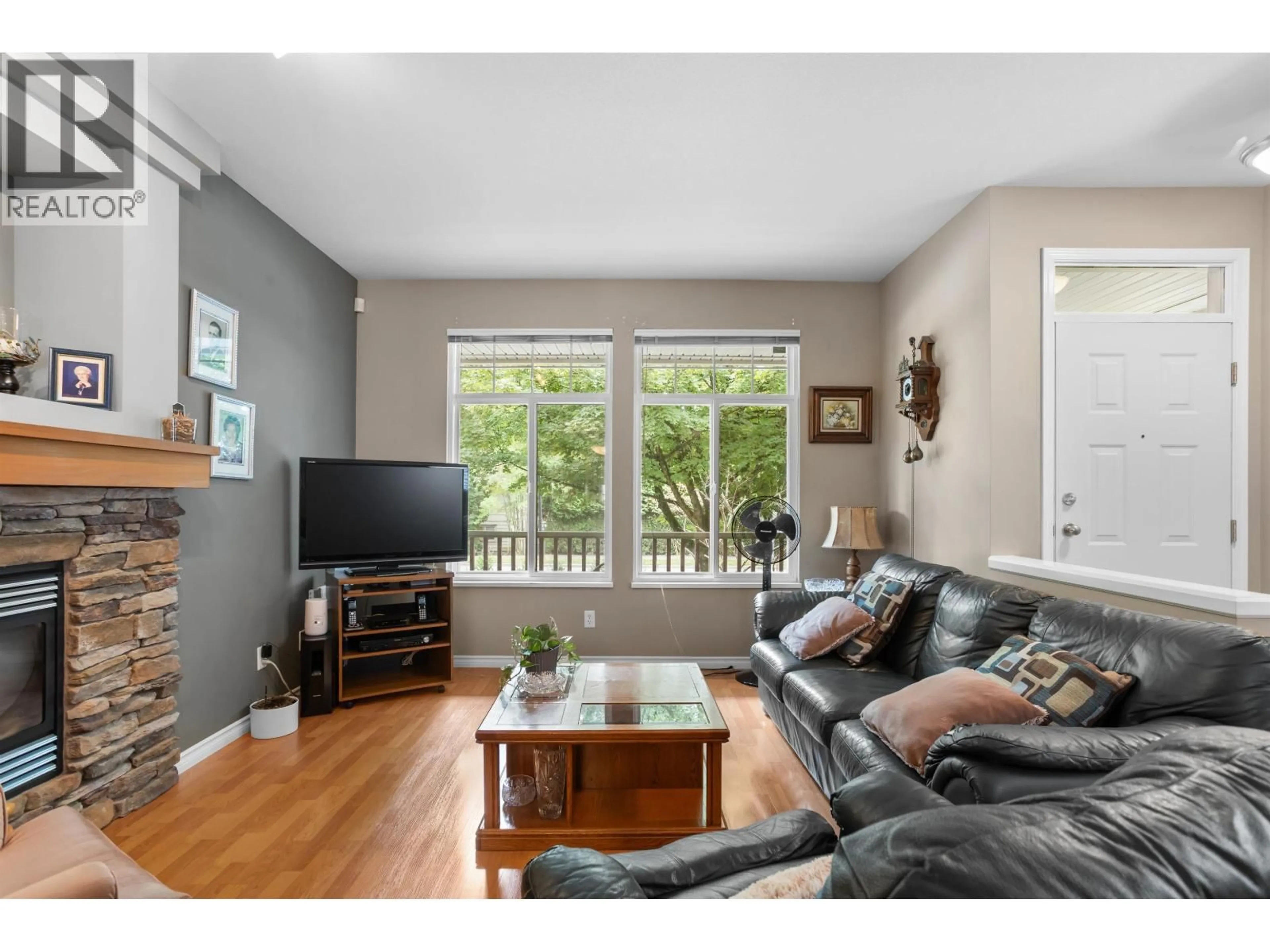 Living room with furniture, wood/laminate floor for 23635 DEWDNEY TRUNK ROAD, Maple Ridge British Columbia V4R2W9