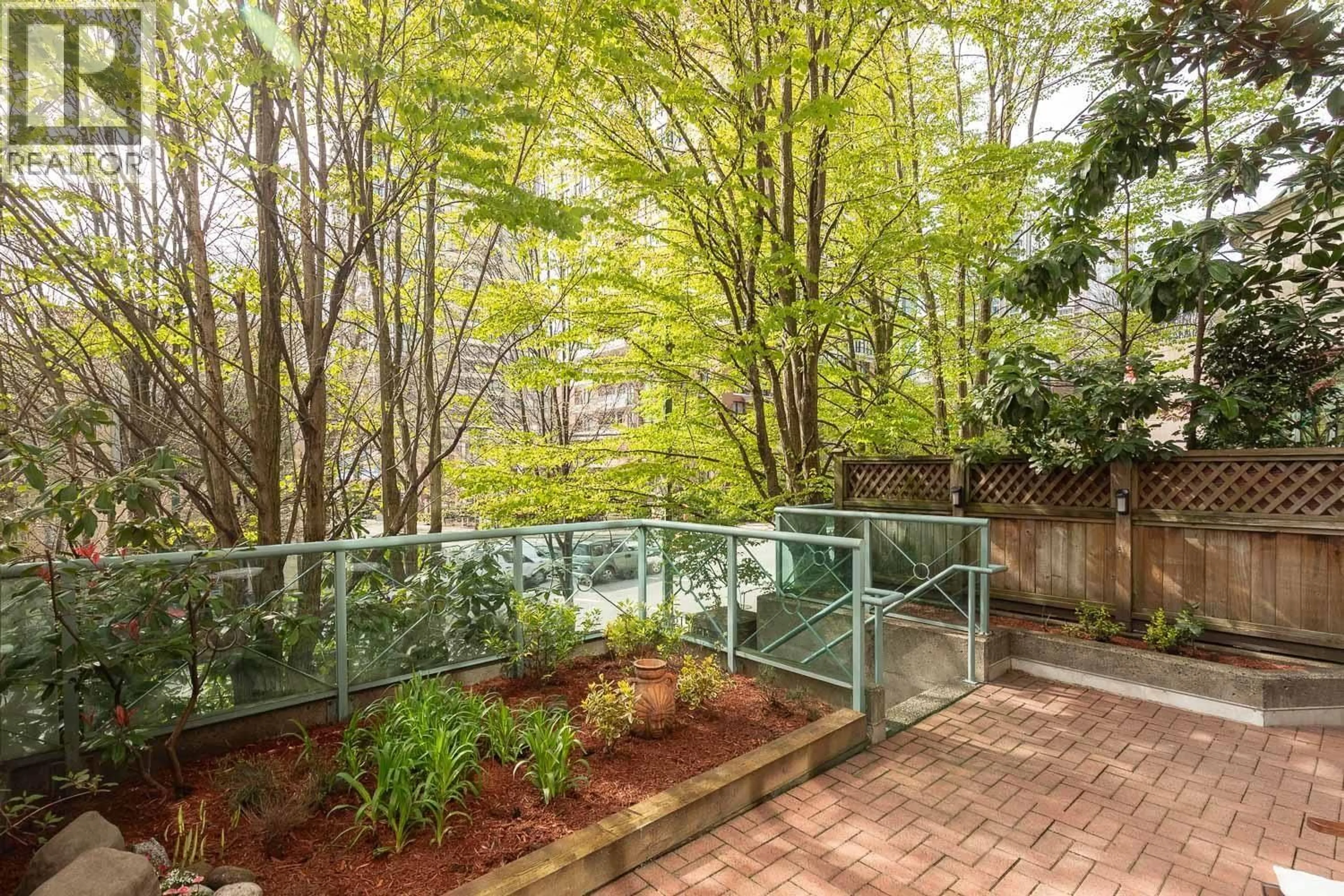 Patio, forest/trees view for 104 - 293 SMITHE STREET, Vancouver British Columbia V6B5W4