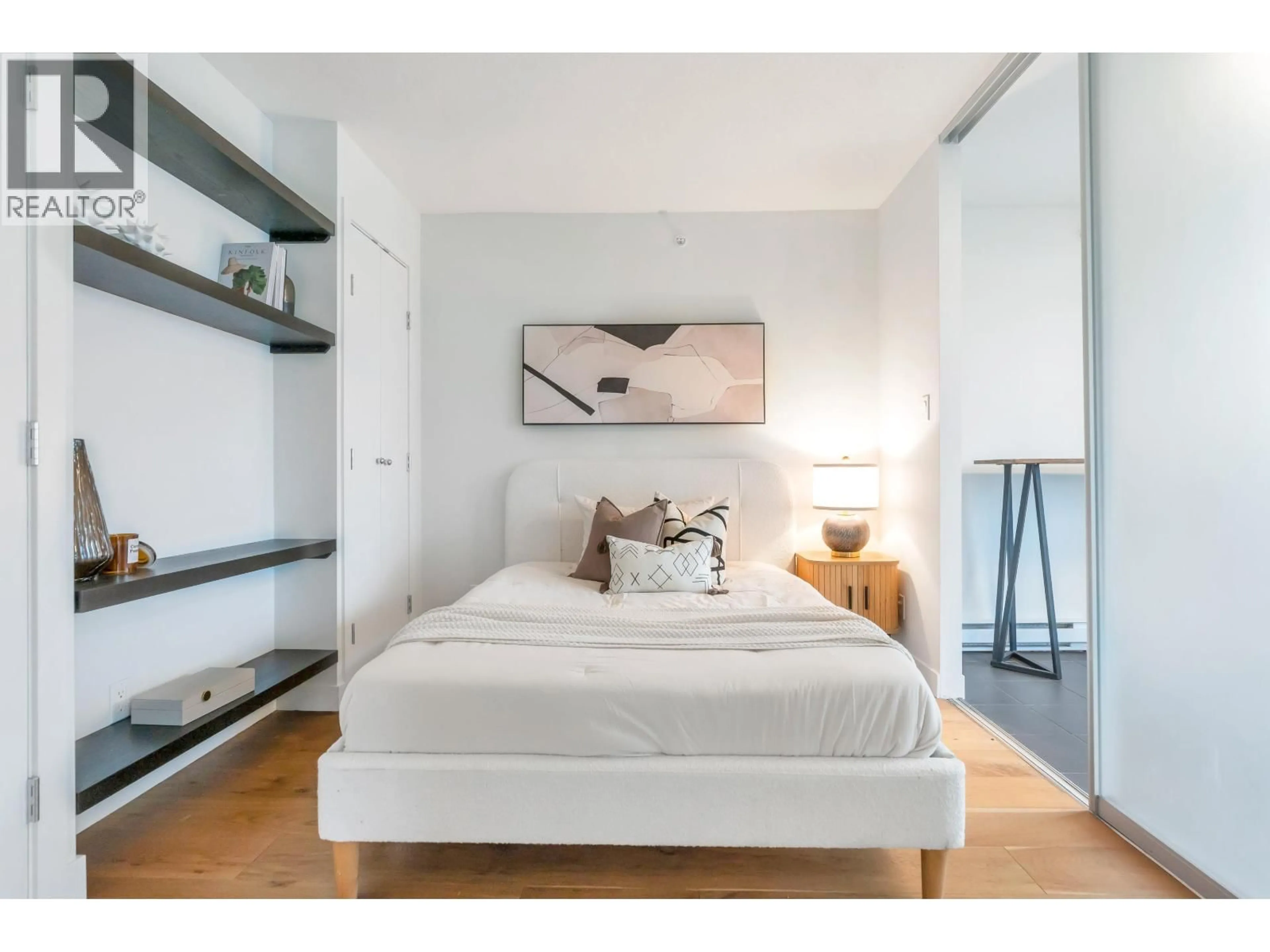 Bedroom with bed, wood/laminate floor for 1003 - 1055 HOMER STREET, Vancouver British Columbia V6B1G3