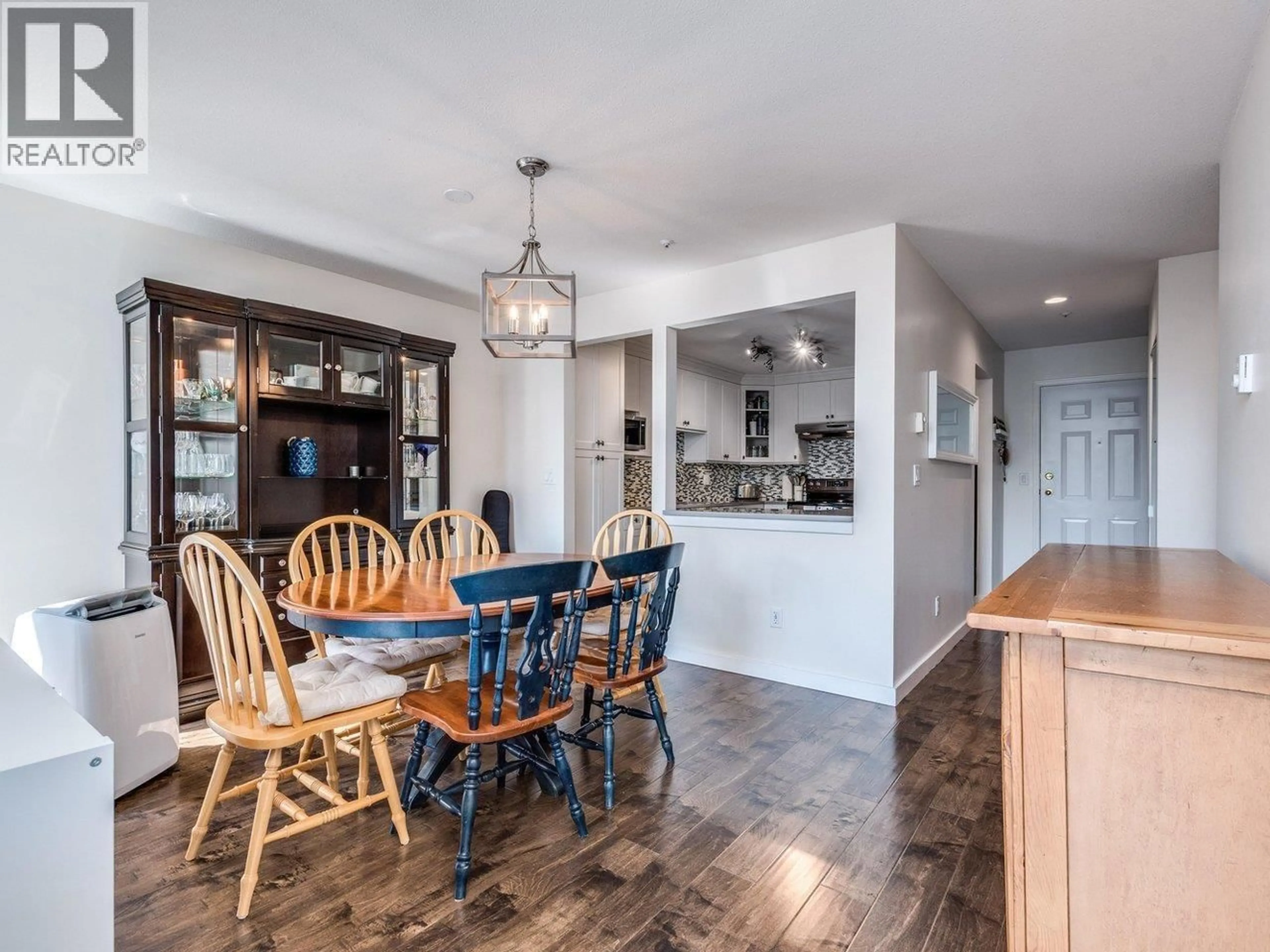 Open concept kitchen, wood/laminate floor for 309 - 19122 122 AVENUE, Pitt Meadows British Columbia V3Y2N7