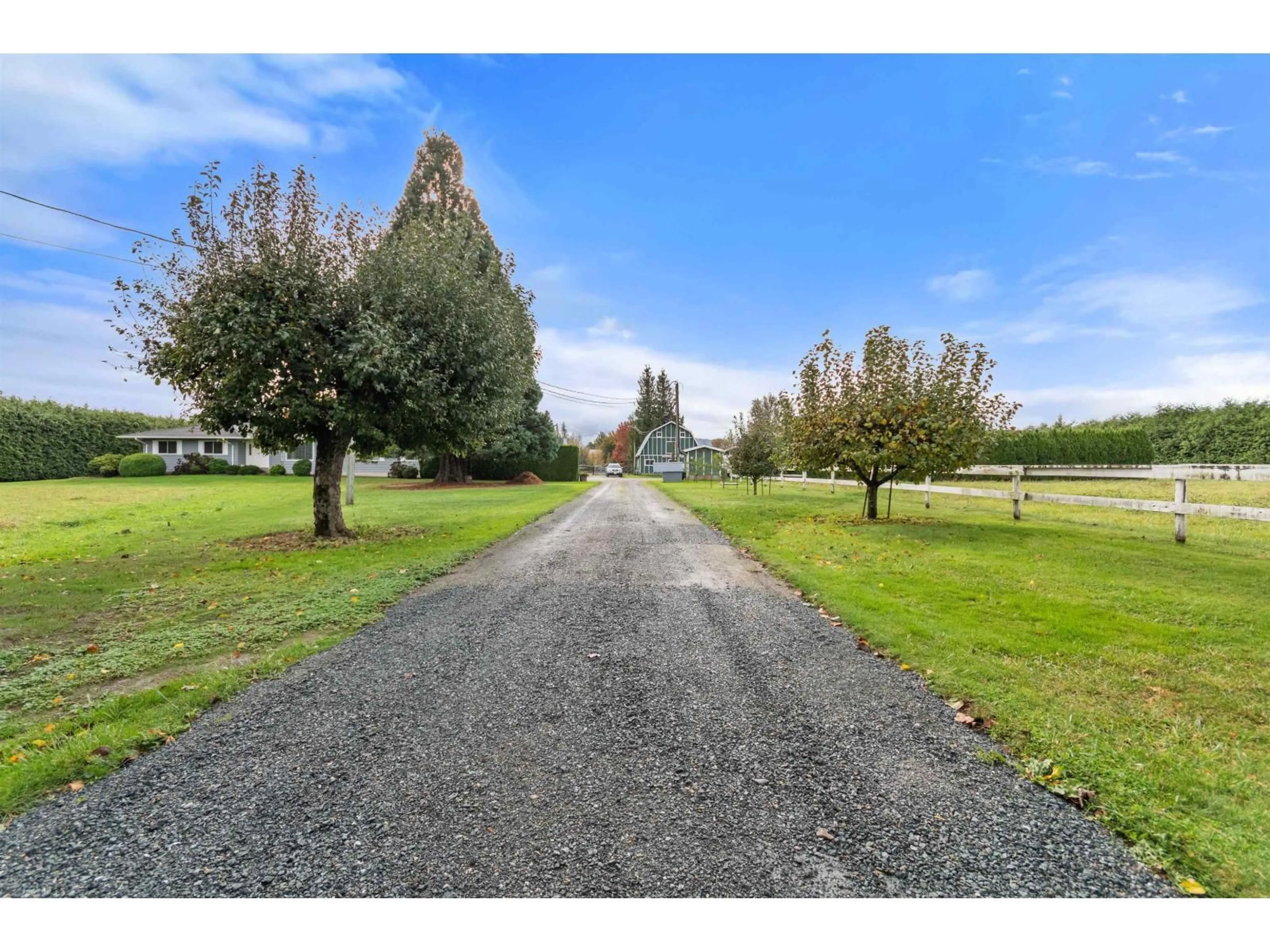 A pic from outside/outdoor area/front of a property/back of a property/a pic from drone, street for 44850 LUCKAKUCK WAY, Chilliwack British Columbia V2R1L4