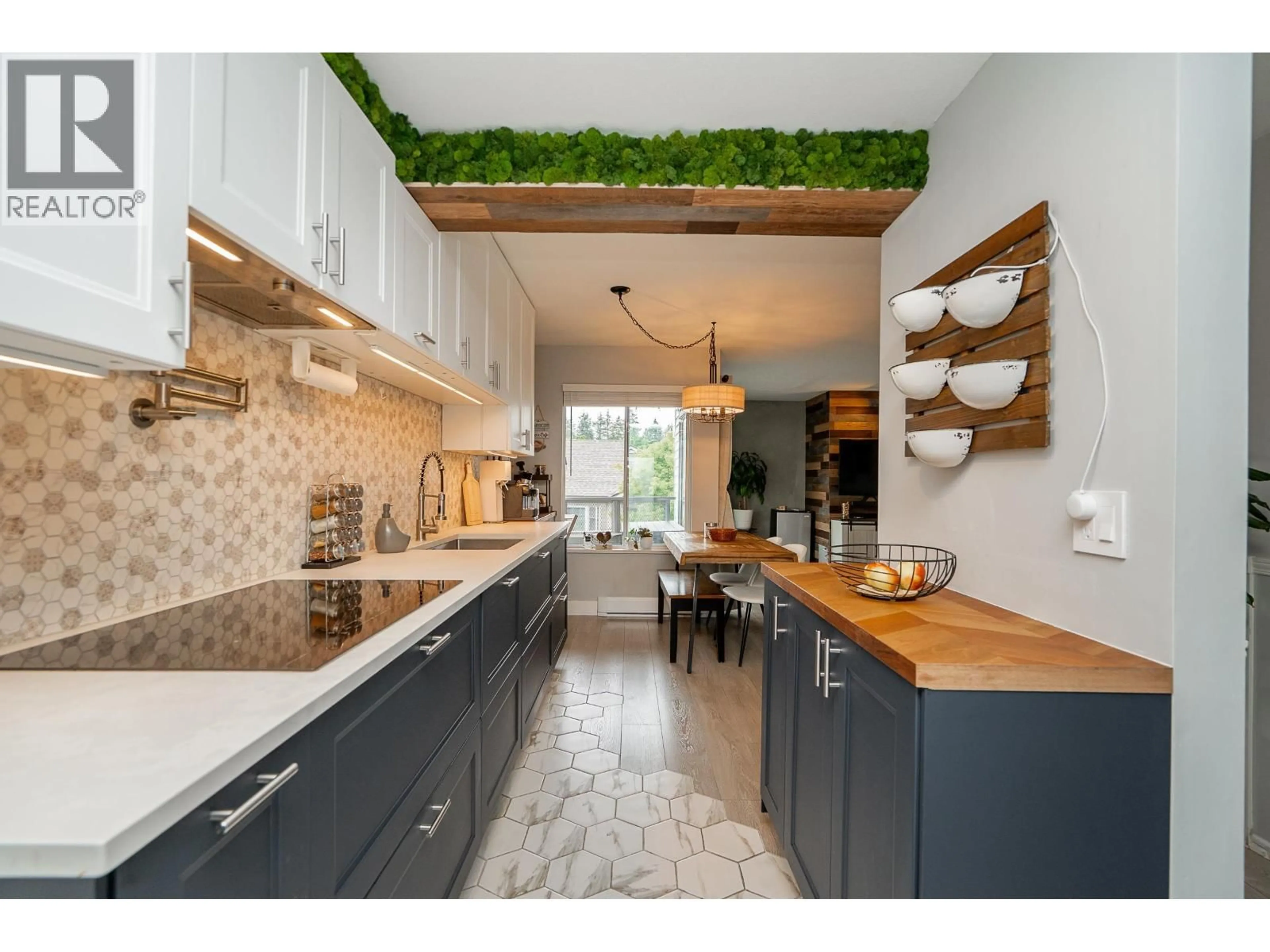 Contemporary kitchen, ceramic/tile floor for 301 - 7465 SANDBORNE AVENUE, Burnaby British Columbia V3N4W7