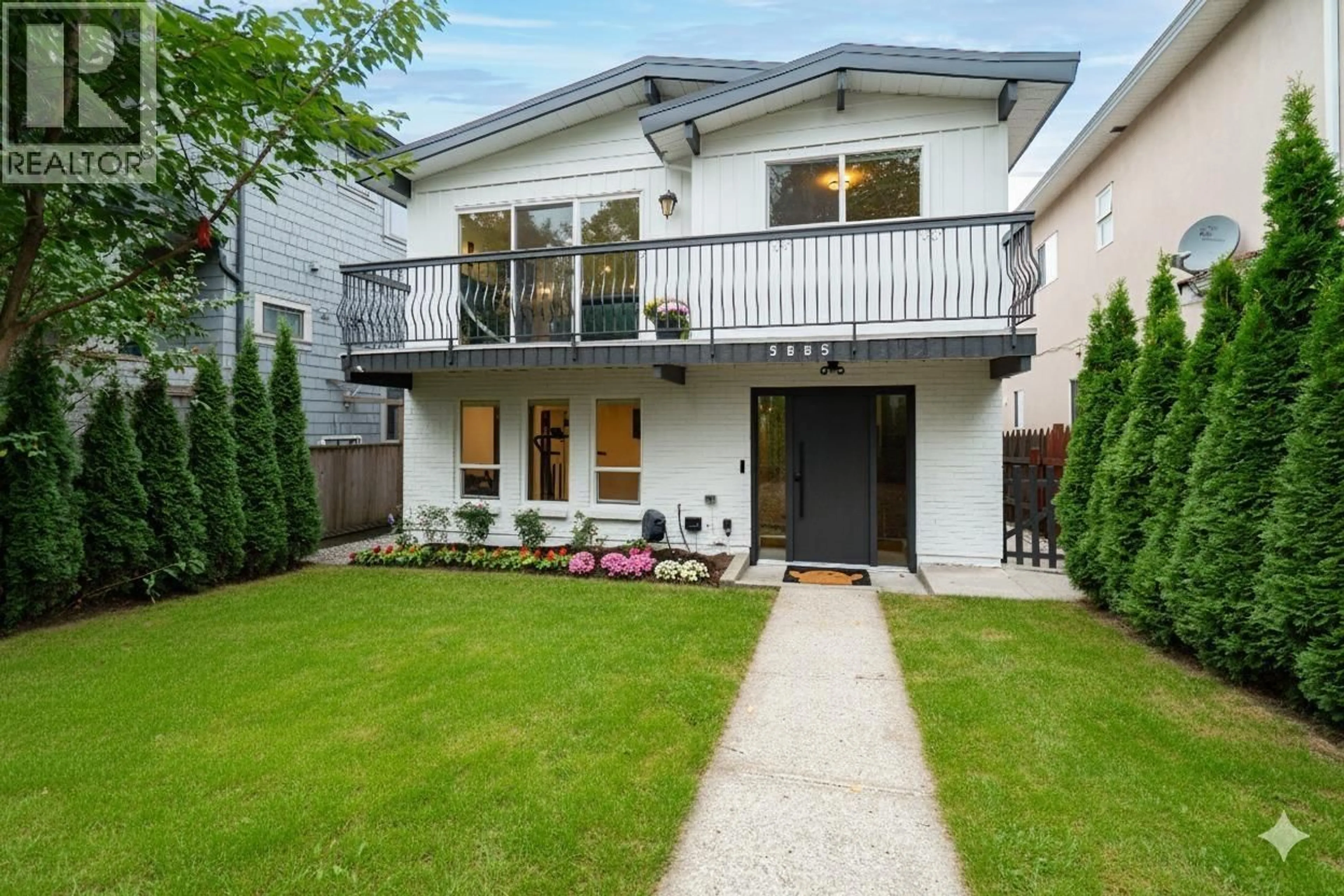 Home with brick exterior material, street for 5885 SHERBROOKE STREET, Vancouver British Columbia V5W3N1