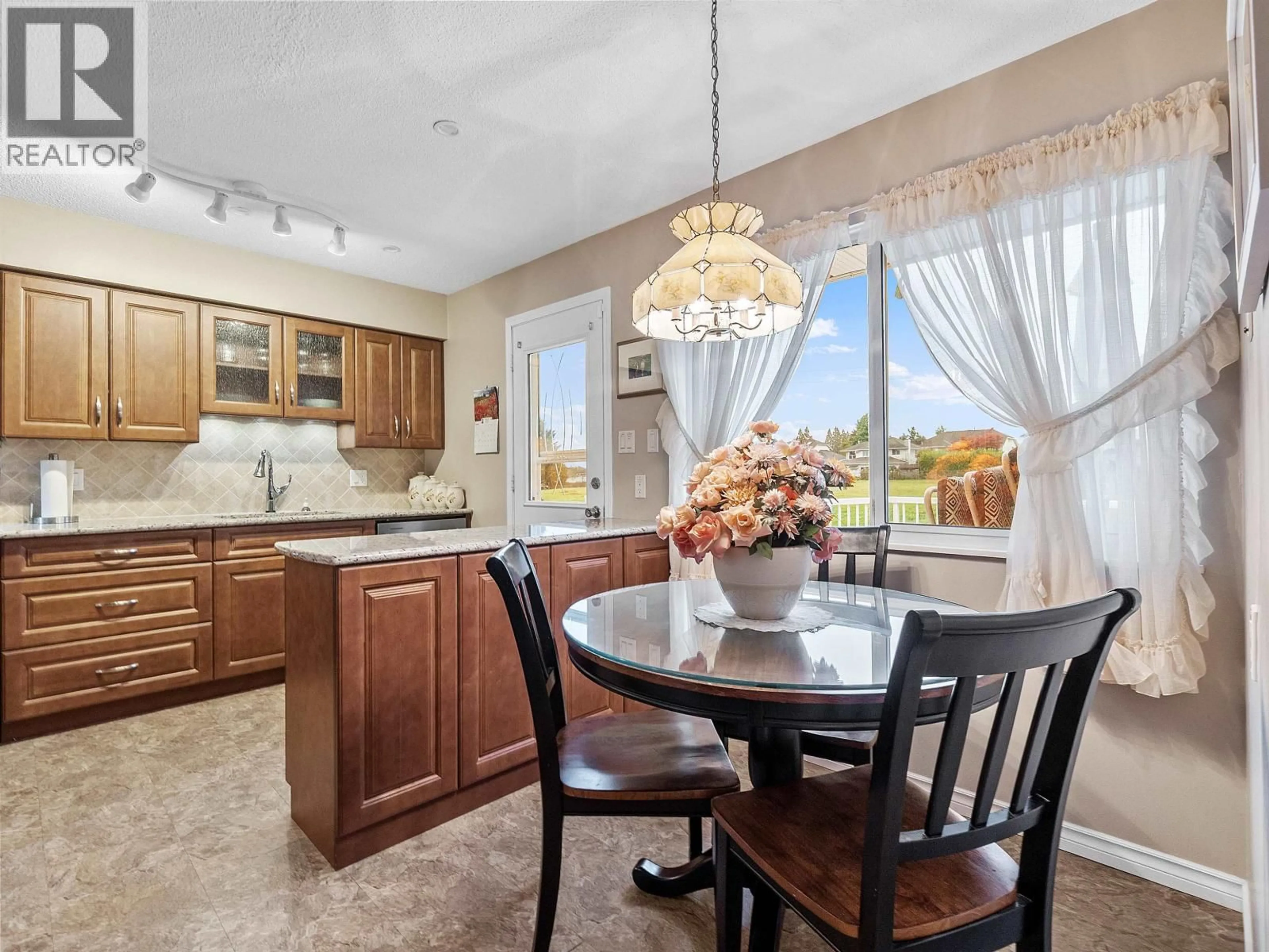 Open concept kitchen, ceramic/tile floor for 1940 ROUTLEY AVENUE, Port Coquitlam British Columbia V3C1A7