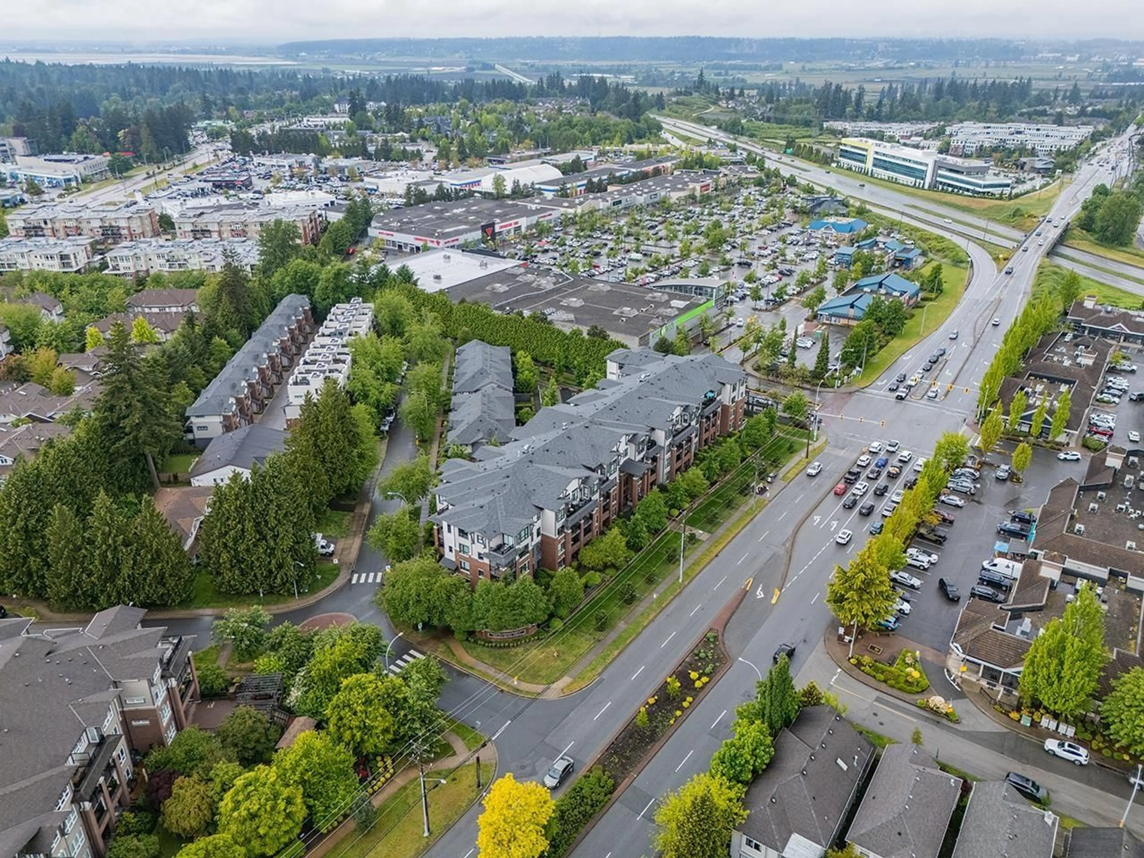 A pic from outside/outdoor area/front of a property/back of a property/a pic from drone, unknown for 406 - 2960 151, Surrey British Columbia V4P0G3