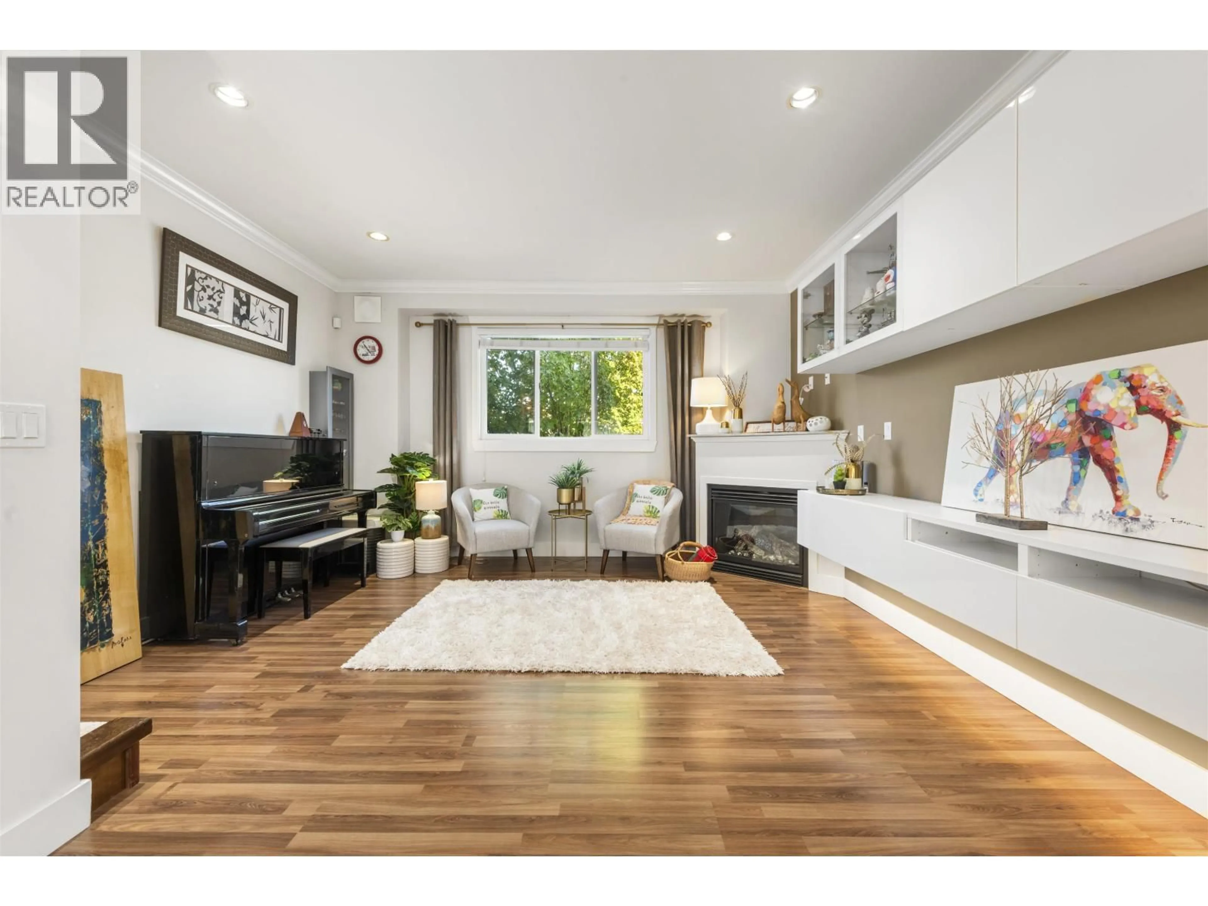 Living room with furniture, wood/laminate floor for 2 - 6551 NO. 4 ROAD, Richmond British Columbia V6Y2T2