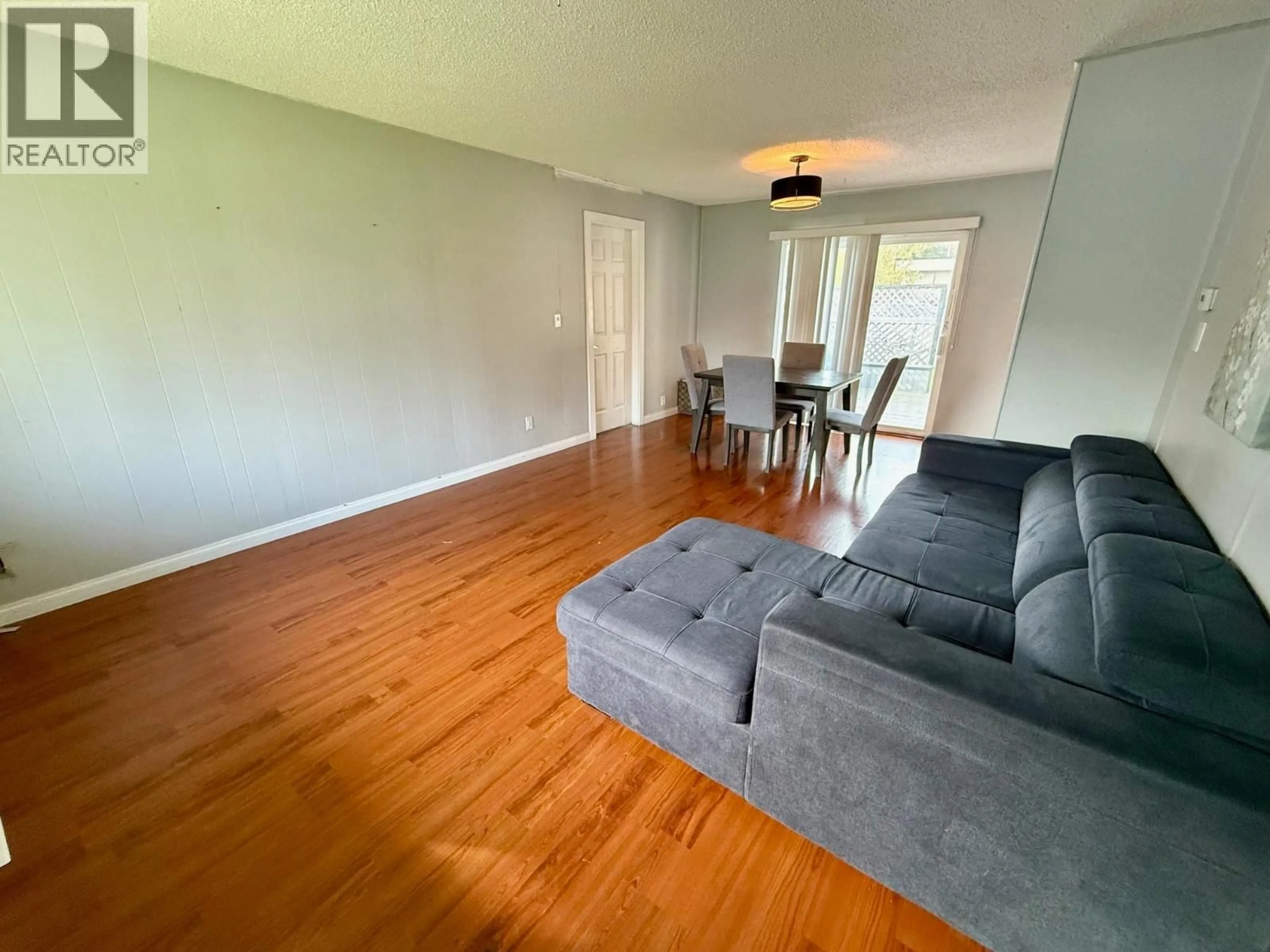 Living room with furniture, wood/laminate floor for 12255 HILLSIDE STREET, Maple Ridge British Columbia V2X5W9