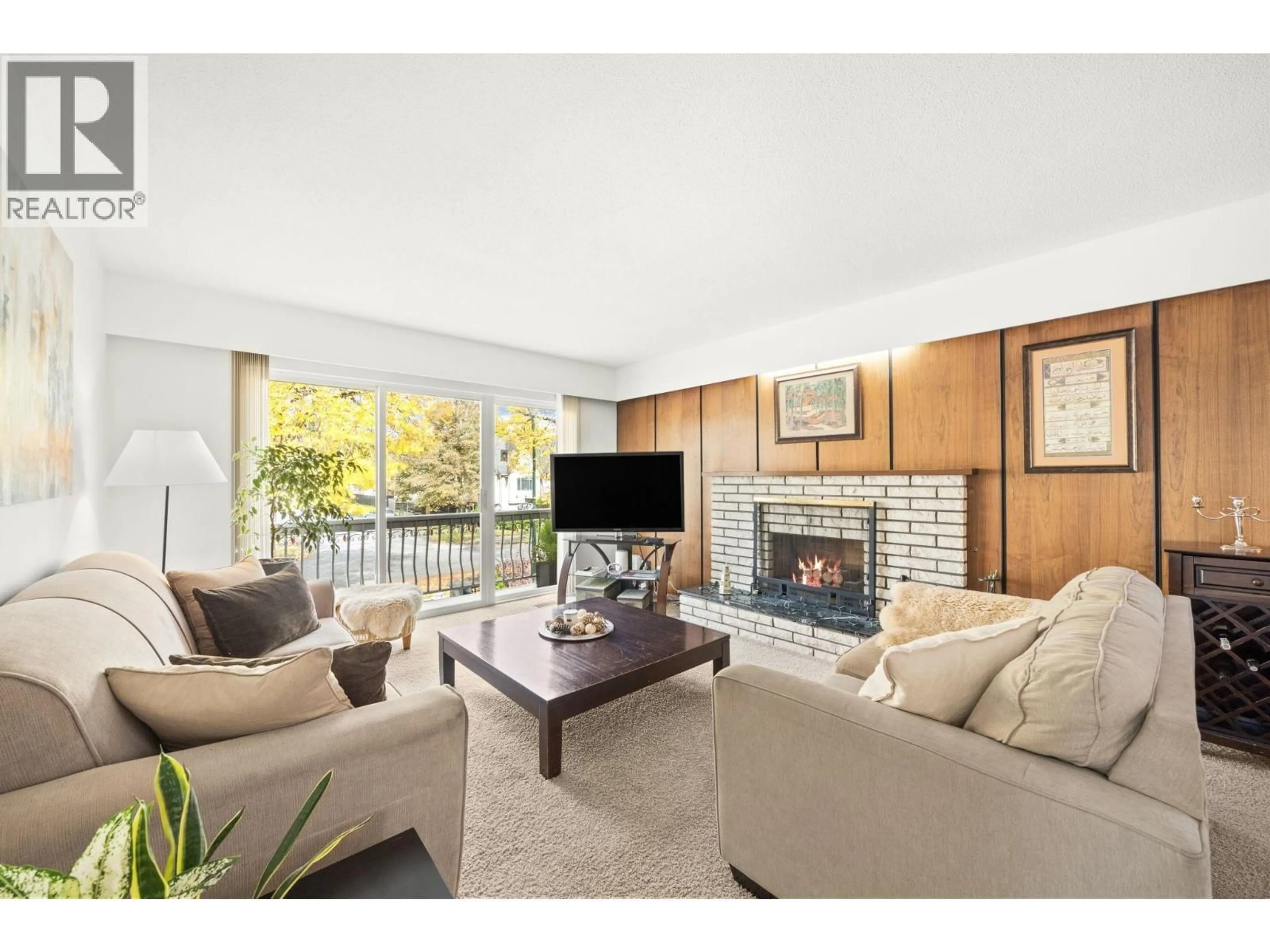 Living room with furniture, wood/laminate floor for 2182 45TH AVENUE, Vancouver British Columbia V5P1N8