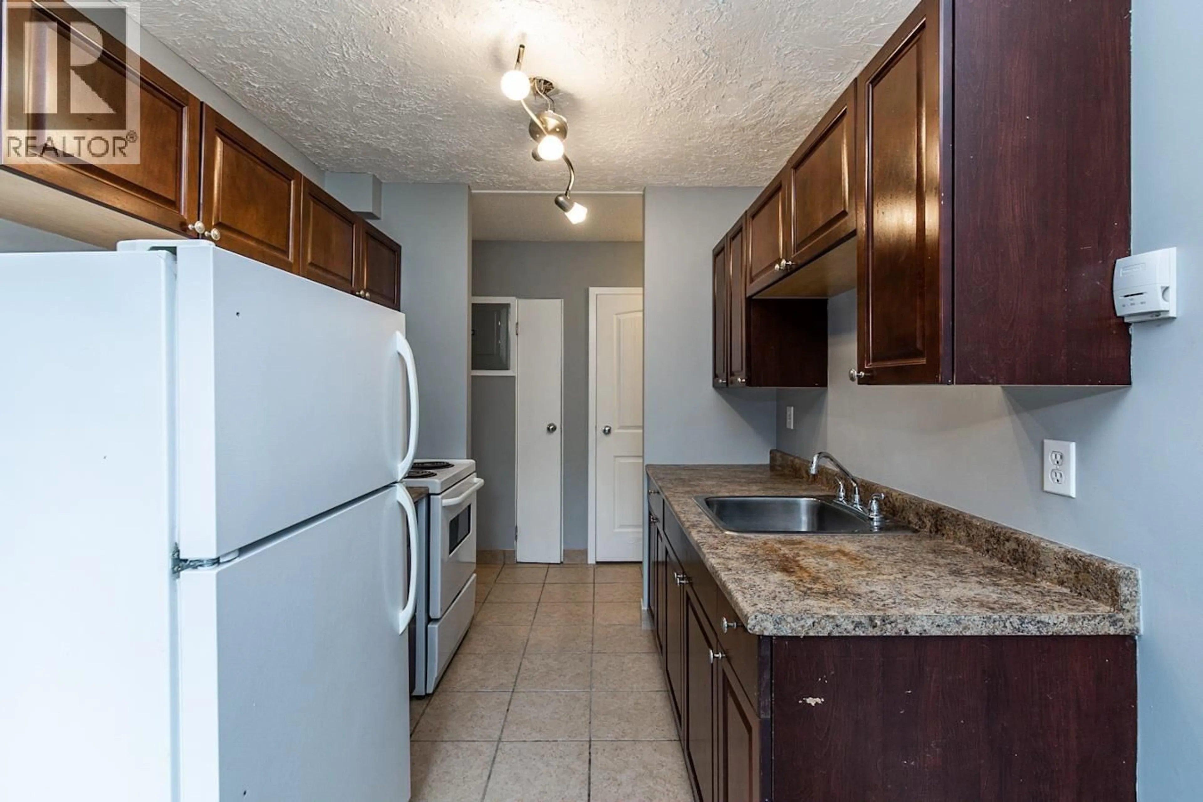 Standard kitchen, unknown for 106 - 1501 QUEENSWAY STREET, Prince George British Columbia V2L1L5