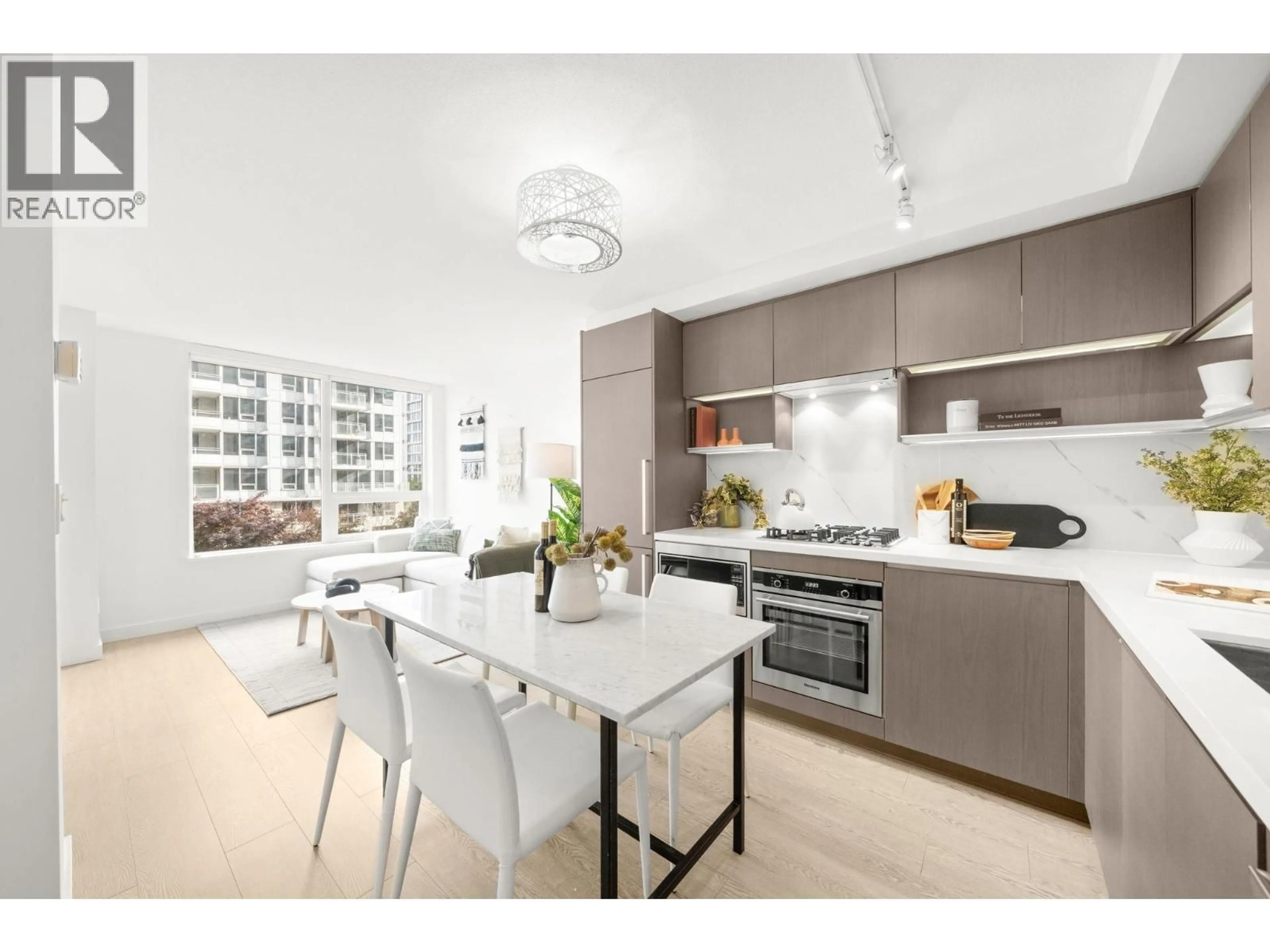 Open concept kitchen, unknown for 617 - 8833 HAZELBRIDGE WAY, Richmond British Columbia V6X0N3