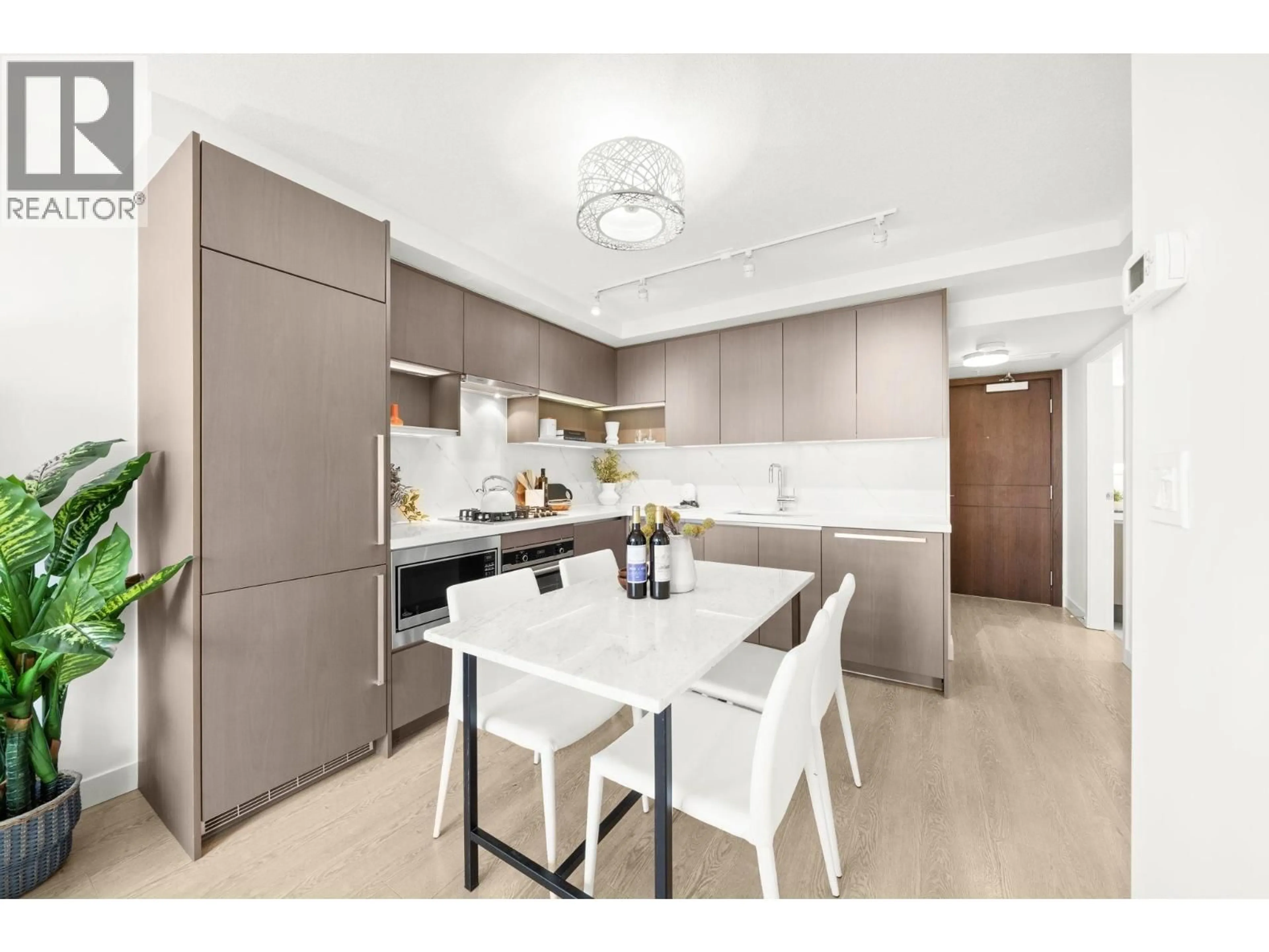 Open concept kitchen, unknown for 617 - 8833 HAZELBRIDGE WAY, Richmond British Columbia V6X0N3