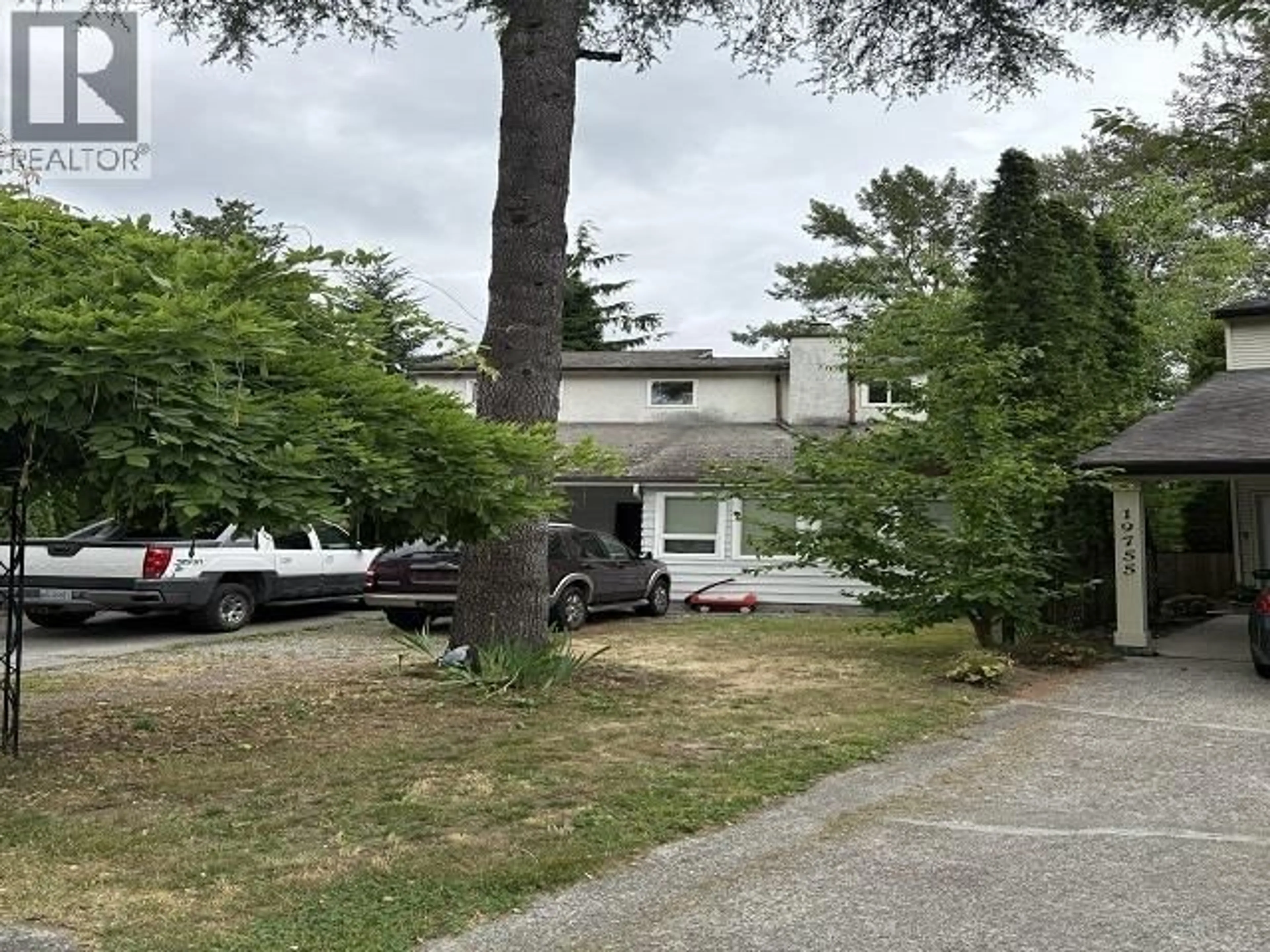 A pic from outside/outdoor area/front of a property/back of a property/a pic from drone, street for 19753 WILDCREST AVENUE, Pitt Meadows British Columbia V3Y1M3