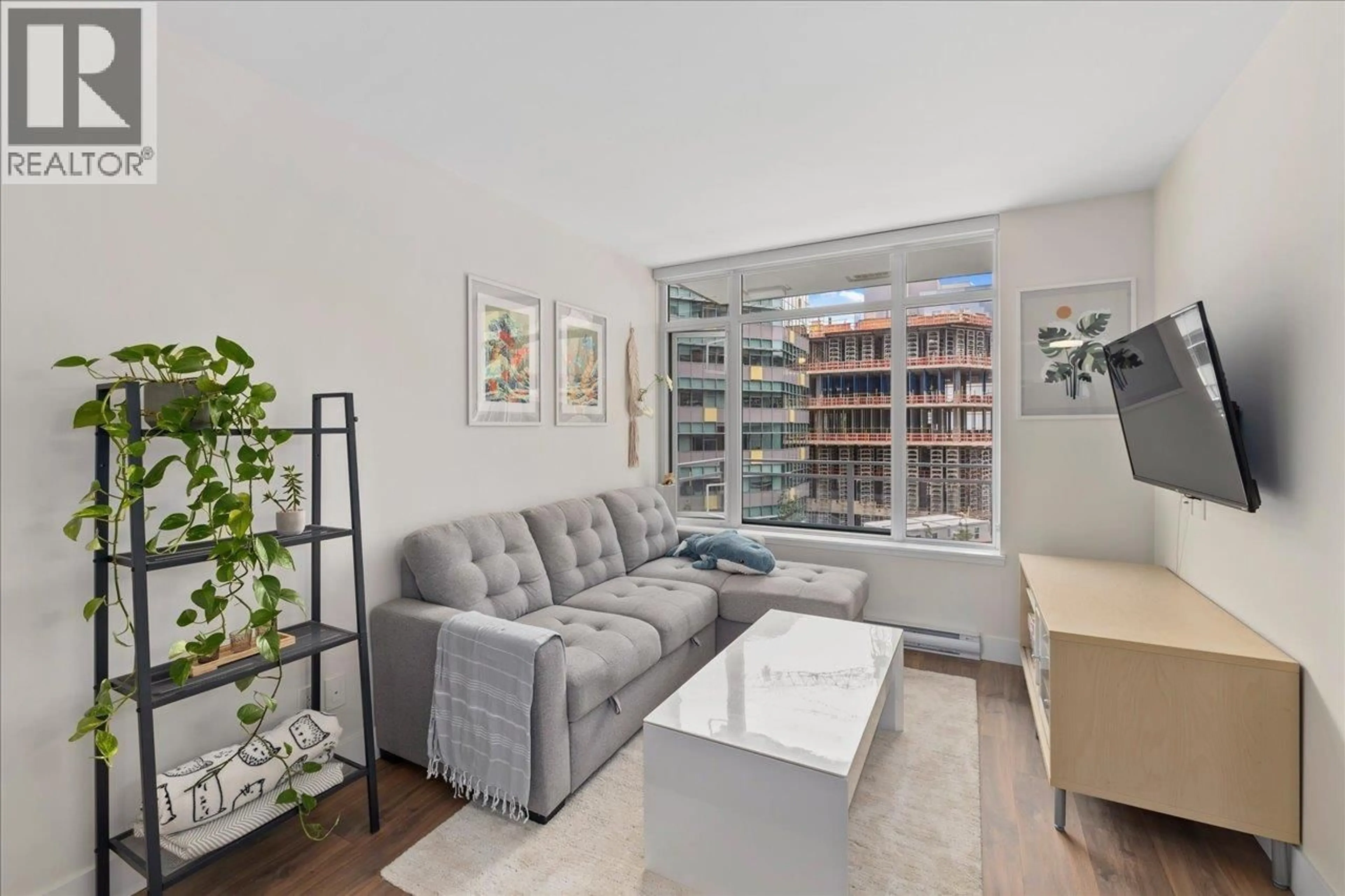 Living room with furniture, unknown for 607 - 258 NELSON'S COURT, New Westminster British Columbia V3L0J9