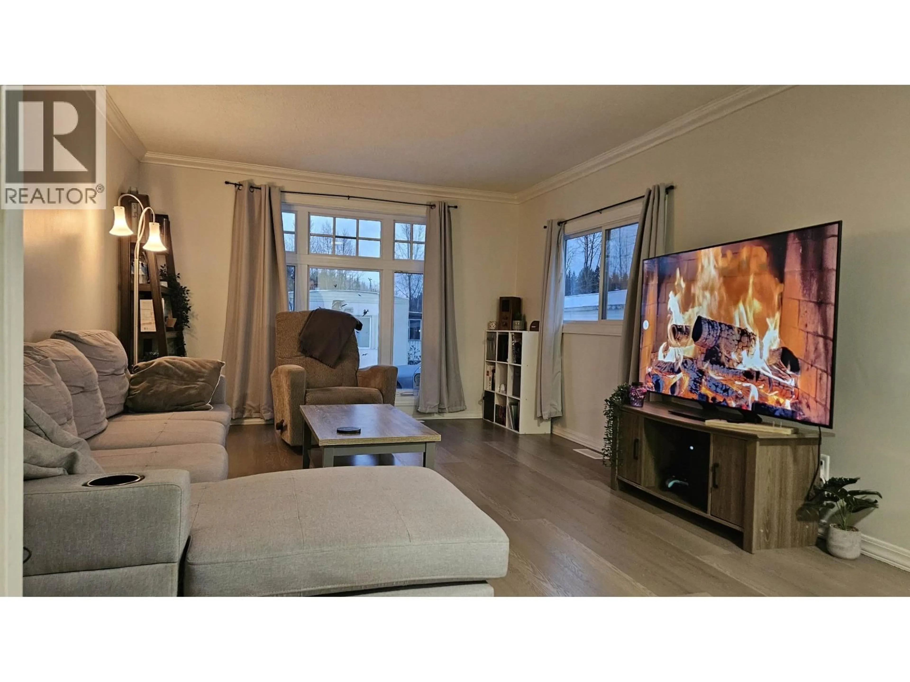 Living room with furniture, wood/laminate floor for A7 - 5931 COOK COURT, Prince George British Columbia V2K1V5