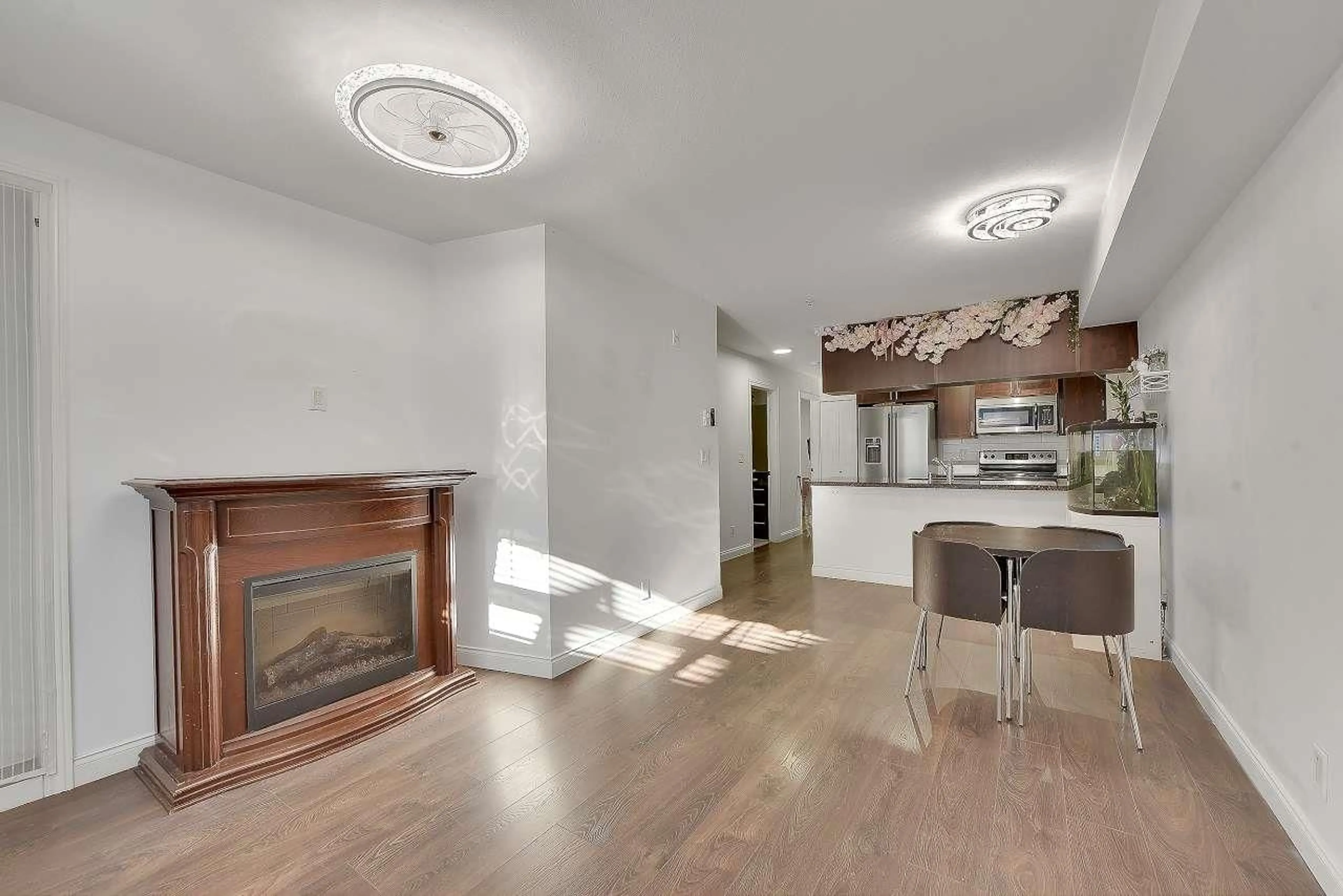 Open concept kitchen, wood/laminate floor for 140 - 5660 201A, Langley British Columbia V3A0B4