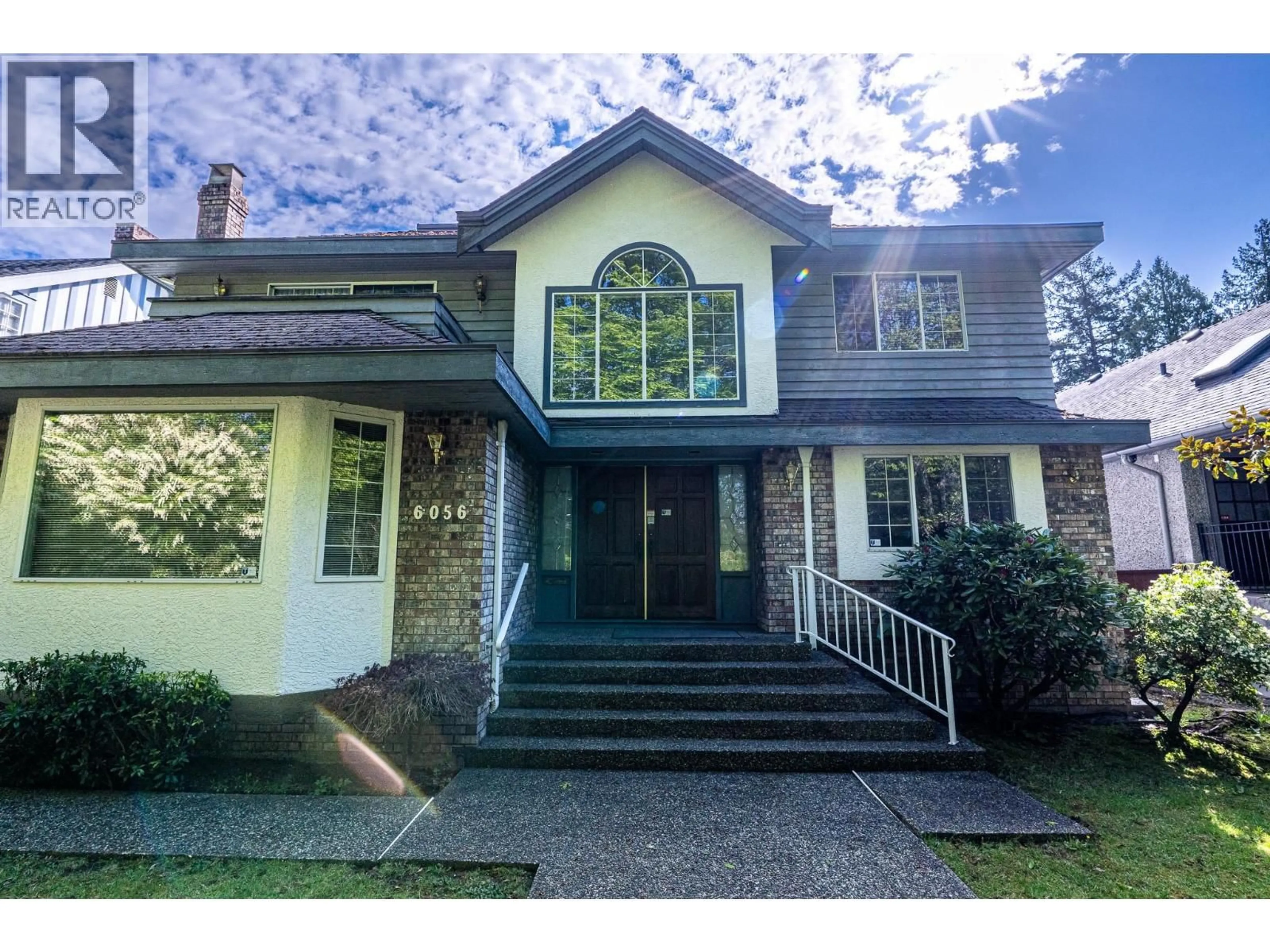 Home with vinyl exterior material, street for 6056 TRAFALGAR STREET, Vancouver British Columbia V6N1C4