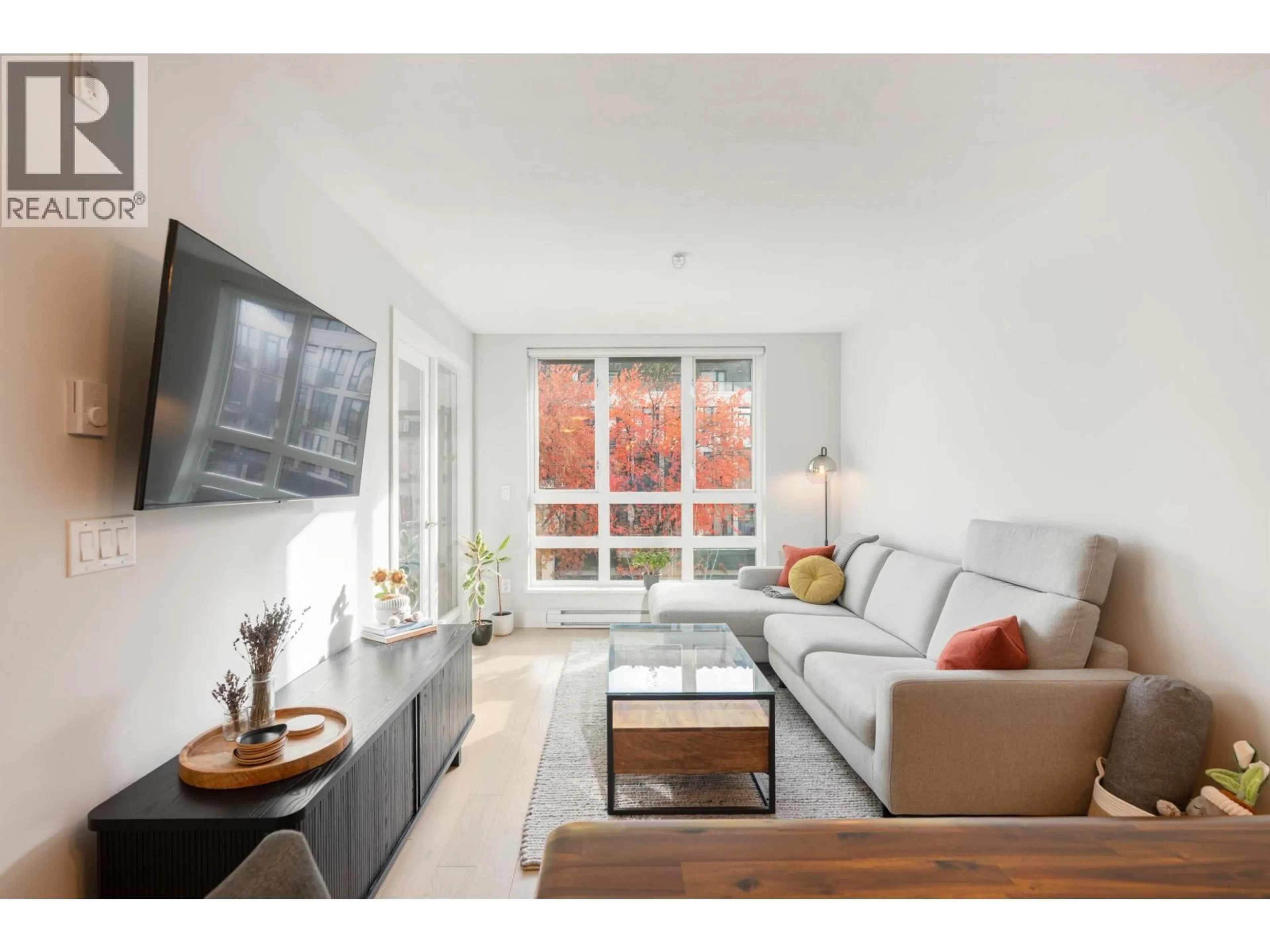 Living room with furniture, unknown for 406 - 2477 CAROLINA STREET, Vancouver British Columbia V5T3S8