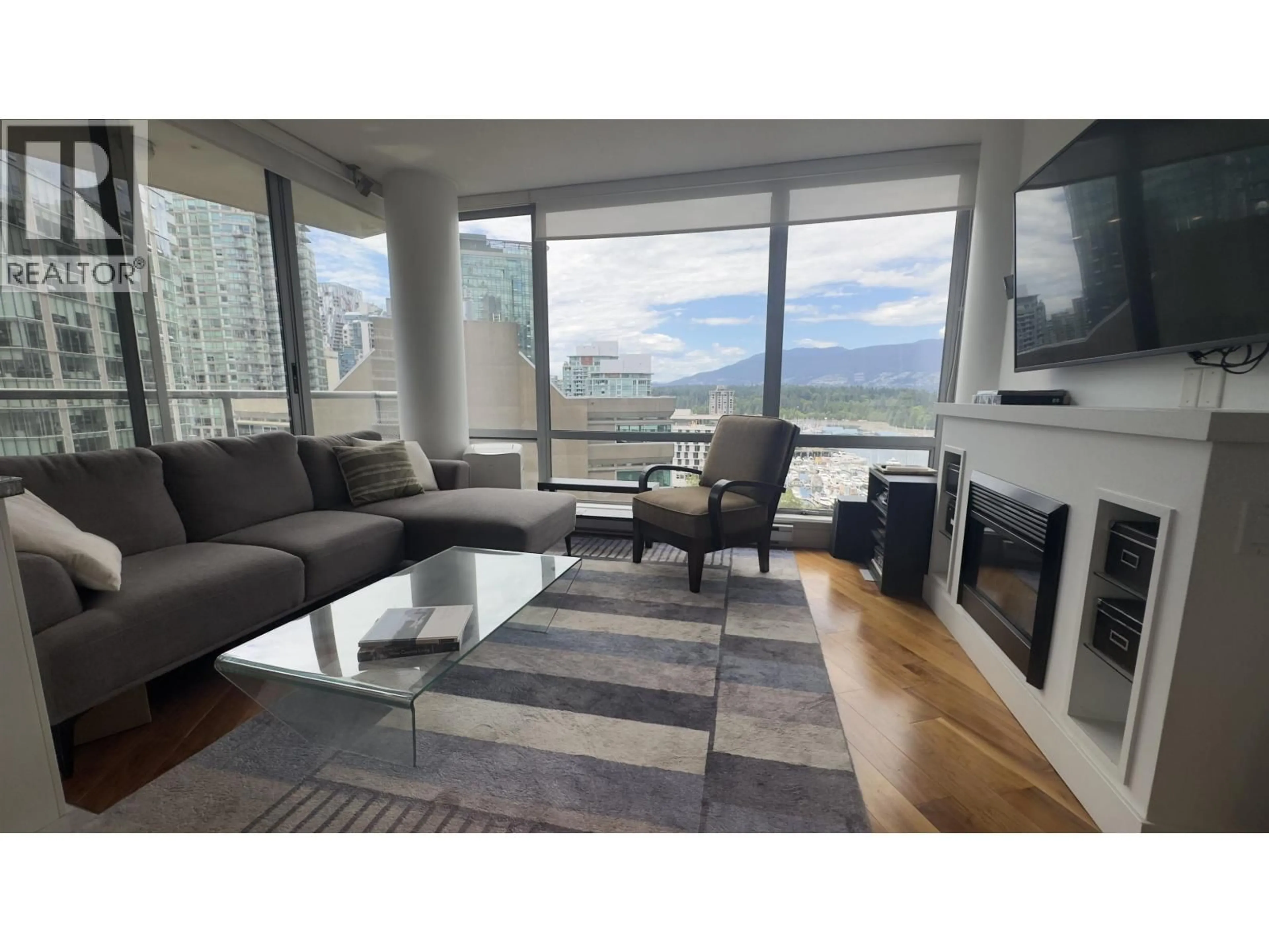 Living room with furniture, wood/laminate floor for 1404 - 1228 HASTINGS STREET, Vancouver British Columbia V6E4S6